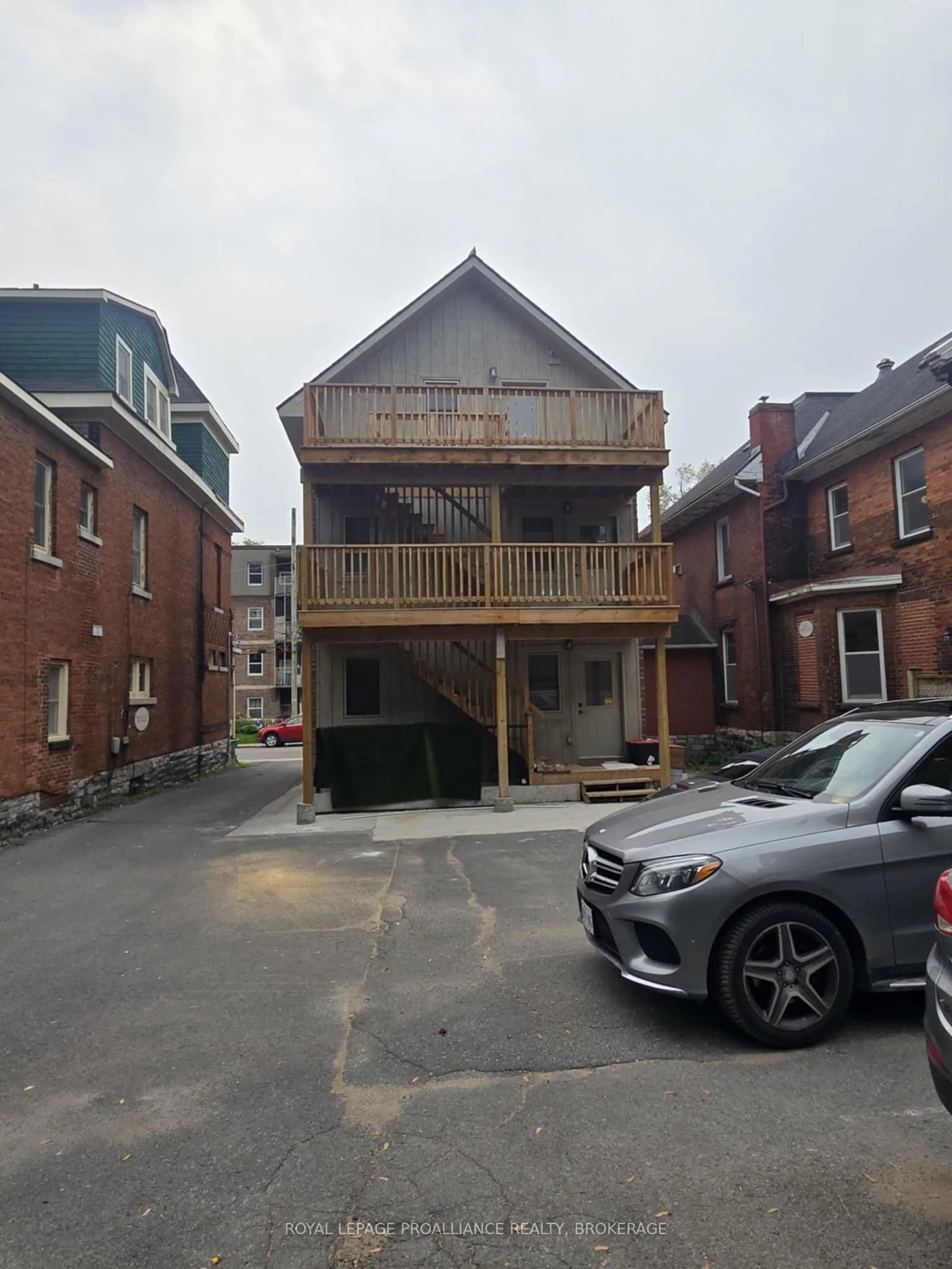A pic from outside/outdoor area/front of a property/back of a property/a pic from drone, street for 184 Bagot St, Kingston Ontario K7L 3G1