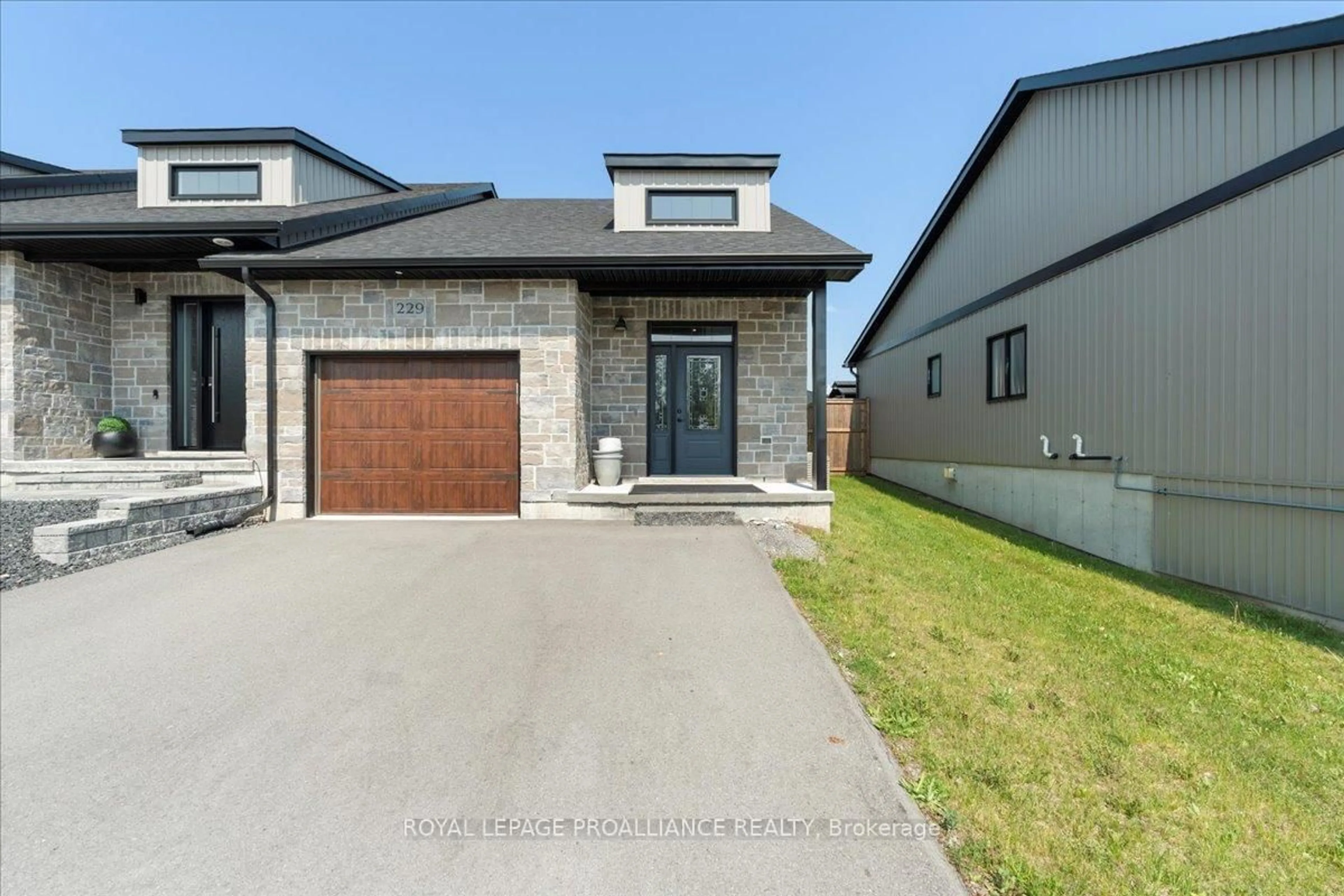 Home with brick exterior material, street for 229 Baker St, Stirling Ontario K0K 3E0