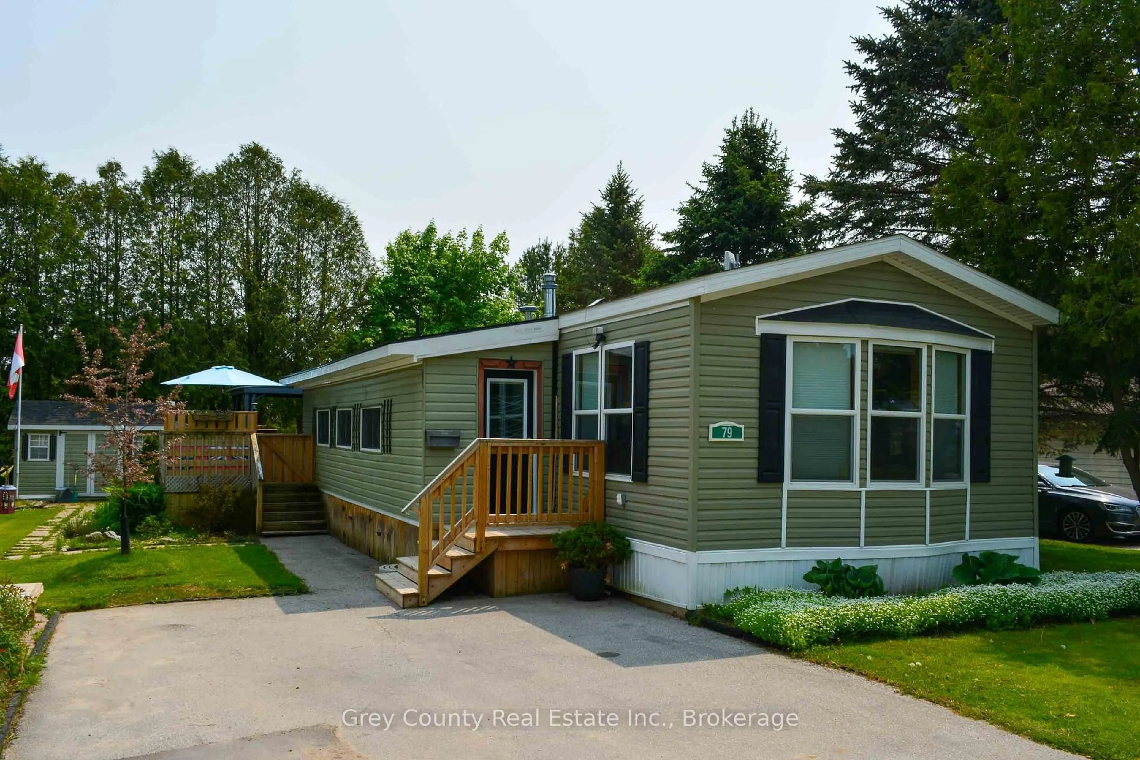 Home with vinyl exterior material, street for 79 Sussex Sq, Georgian Bluffs Ontario N4K 5N5