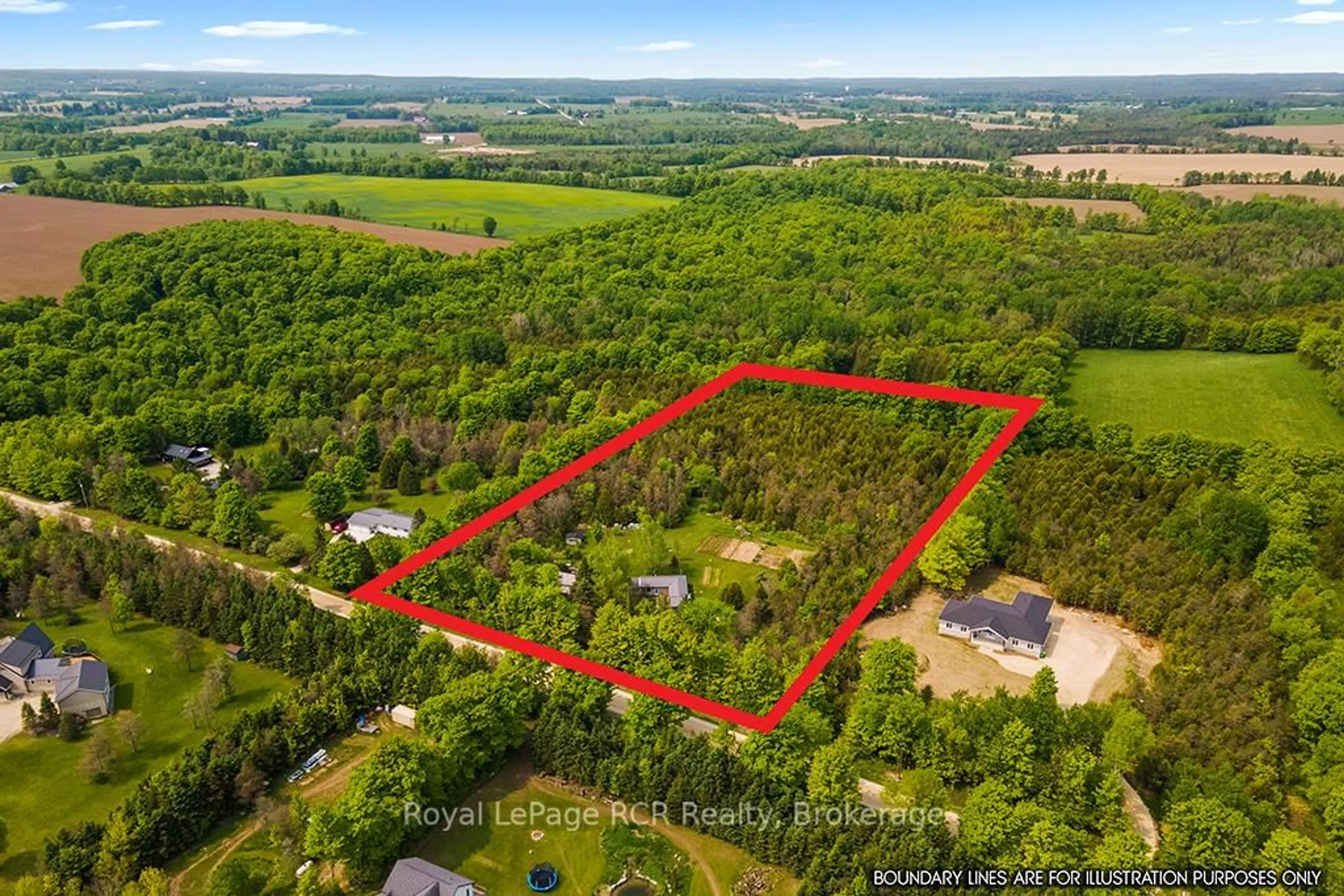 A pic from outside/outdoor area/front of a property/back of a property/a pic from drone, forest/trees view for 134746 Sideroad 15 Sdrd, Grey Highlands Ontario N0C 1H0