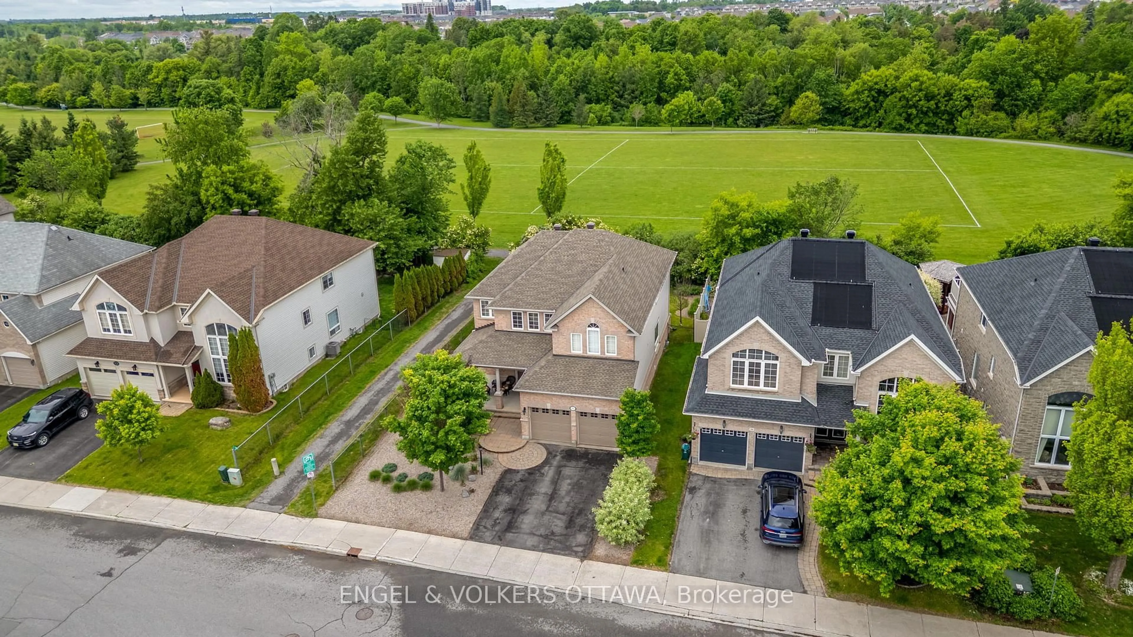 A pic from outside/outdoor area/front of a property/back of a property/a pic from drone, street for 94 Riverstone Dr, Ottawa Ontario K2J 5E3