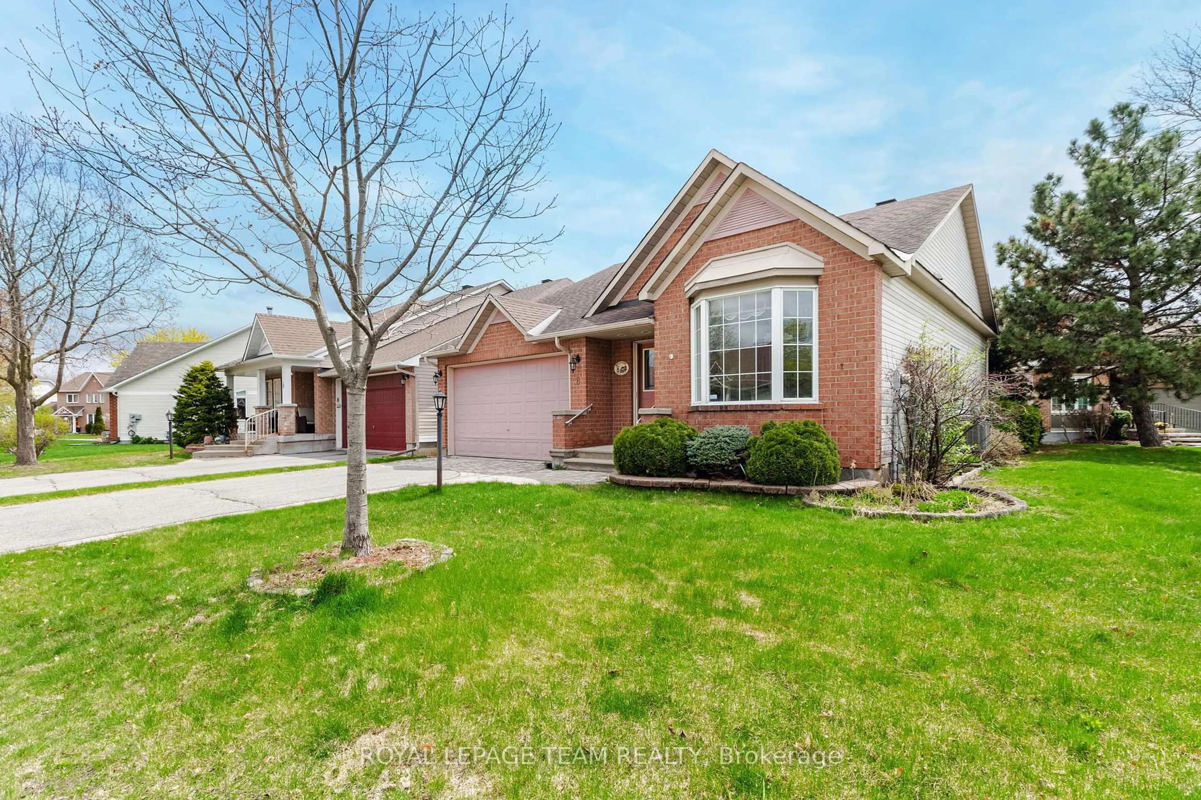 Home with brick exterior material, street for 8 Windchime Cres, Ottawa Ontario K2G 6J3