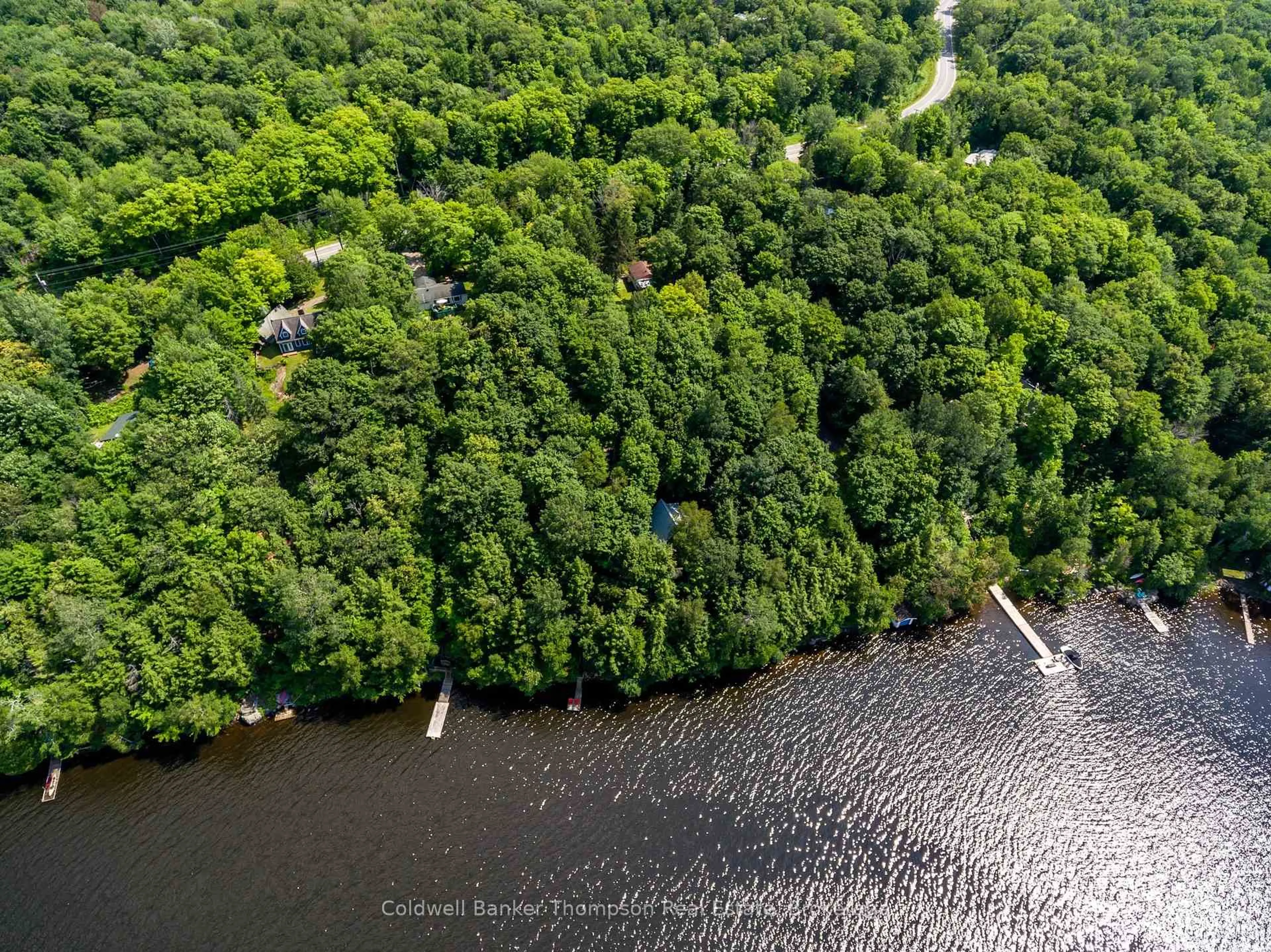 A pic from outside/outdoor area/front of a property/back of a property/a pic from drone, water/lake/river/ocean view for 1258 WINDERMERE Rd #10, Muskoka Lakes Ontario P0B 1M0