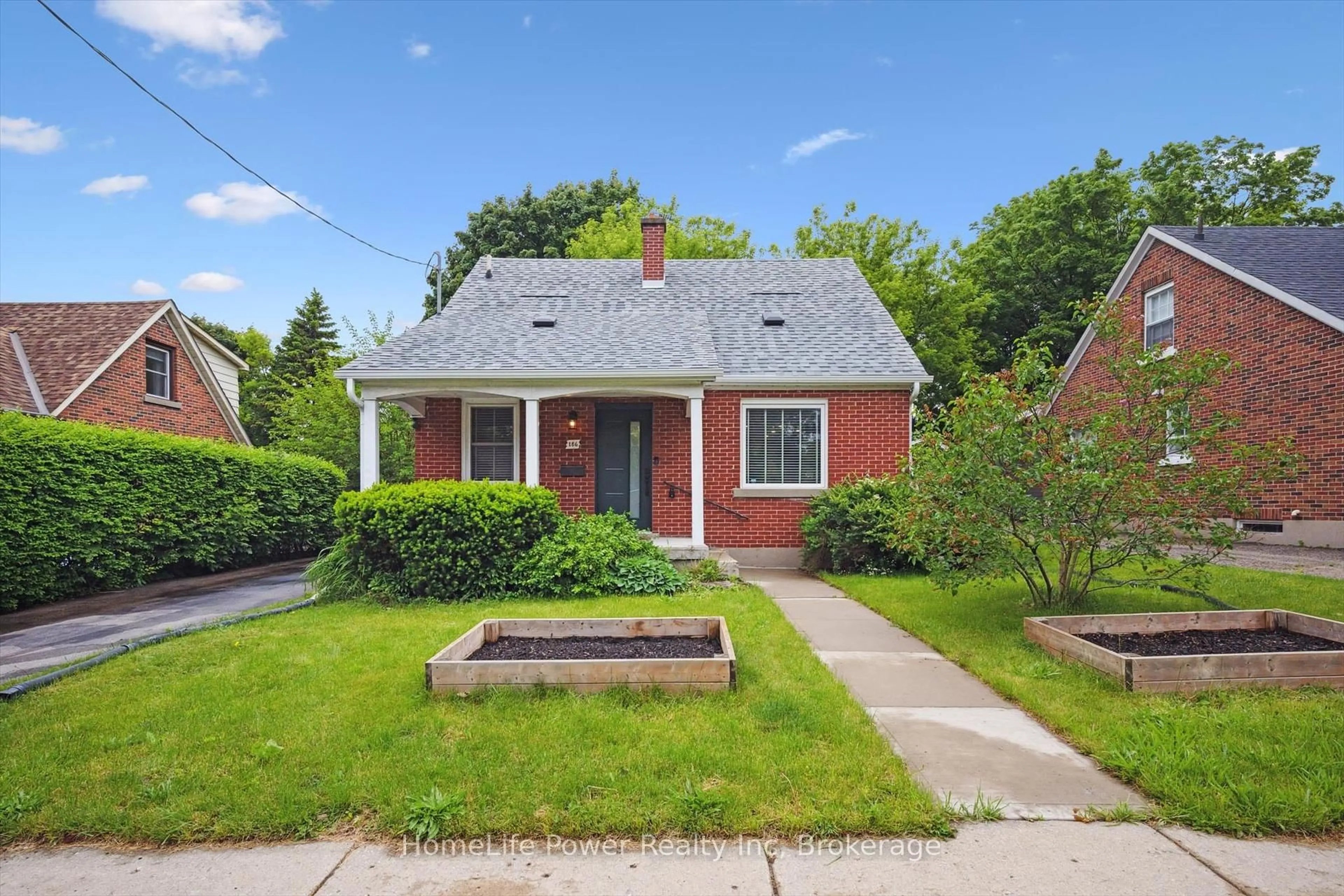 Home with brick exterior material, street for 186 Bridgeport Rd, Waterloo Ontario N2J 2K5