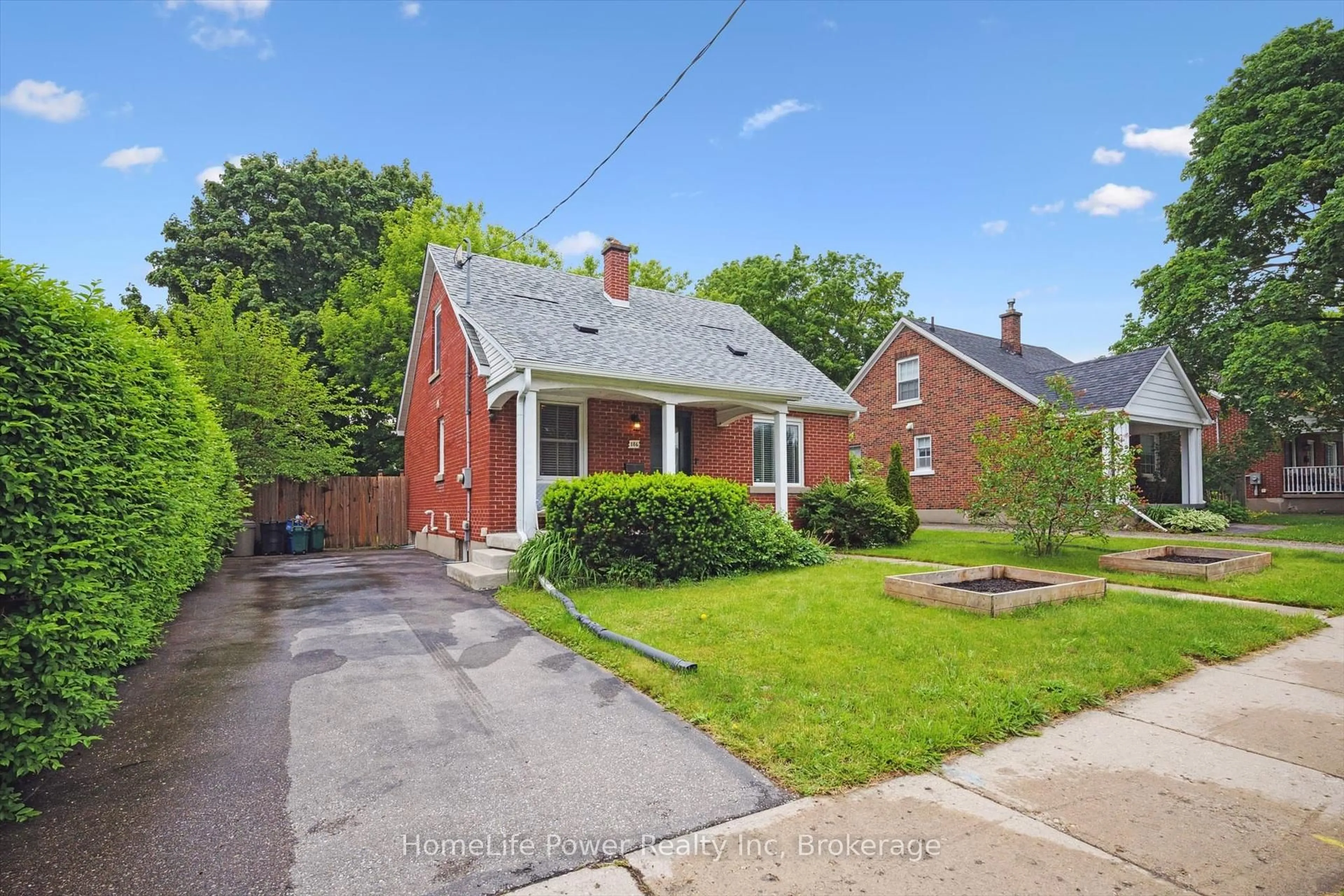 Home with brick exterior material, street for 186 Bridgeport Rd, Waterloo Ontario N2J 2K5