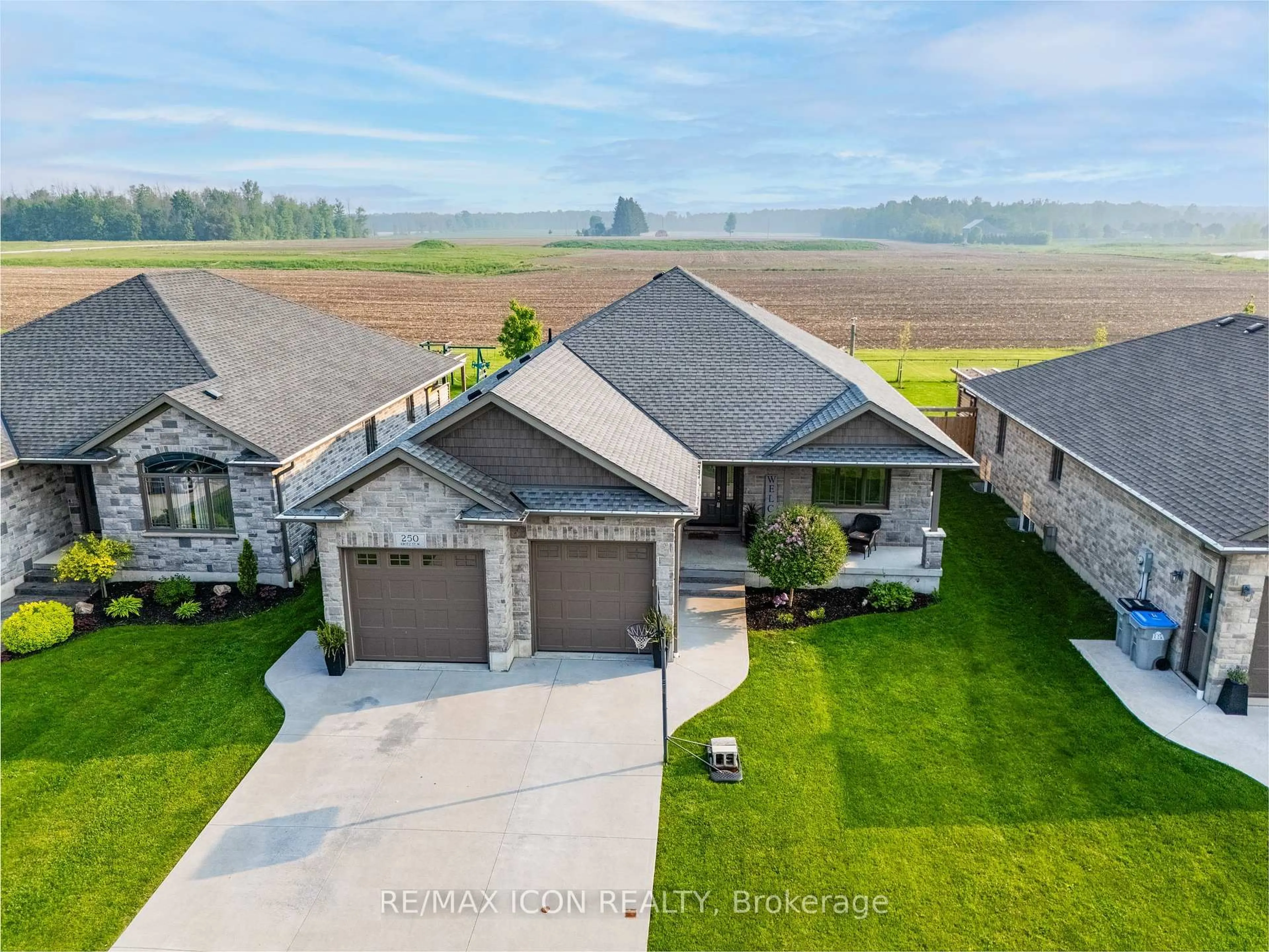 A pic from outside/outdoor area/front of a property/back of a property/a pic from drone, unknown for 250 Krotz St, North Perth Ontario N4W 0E1