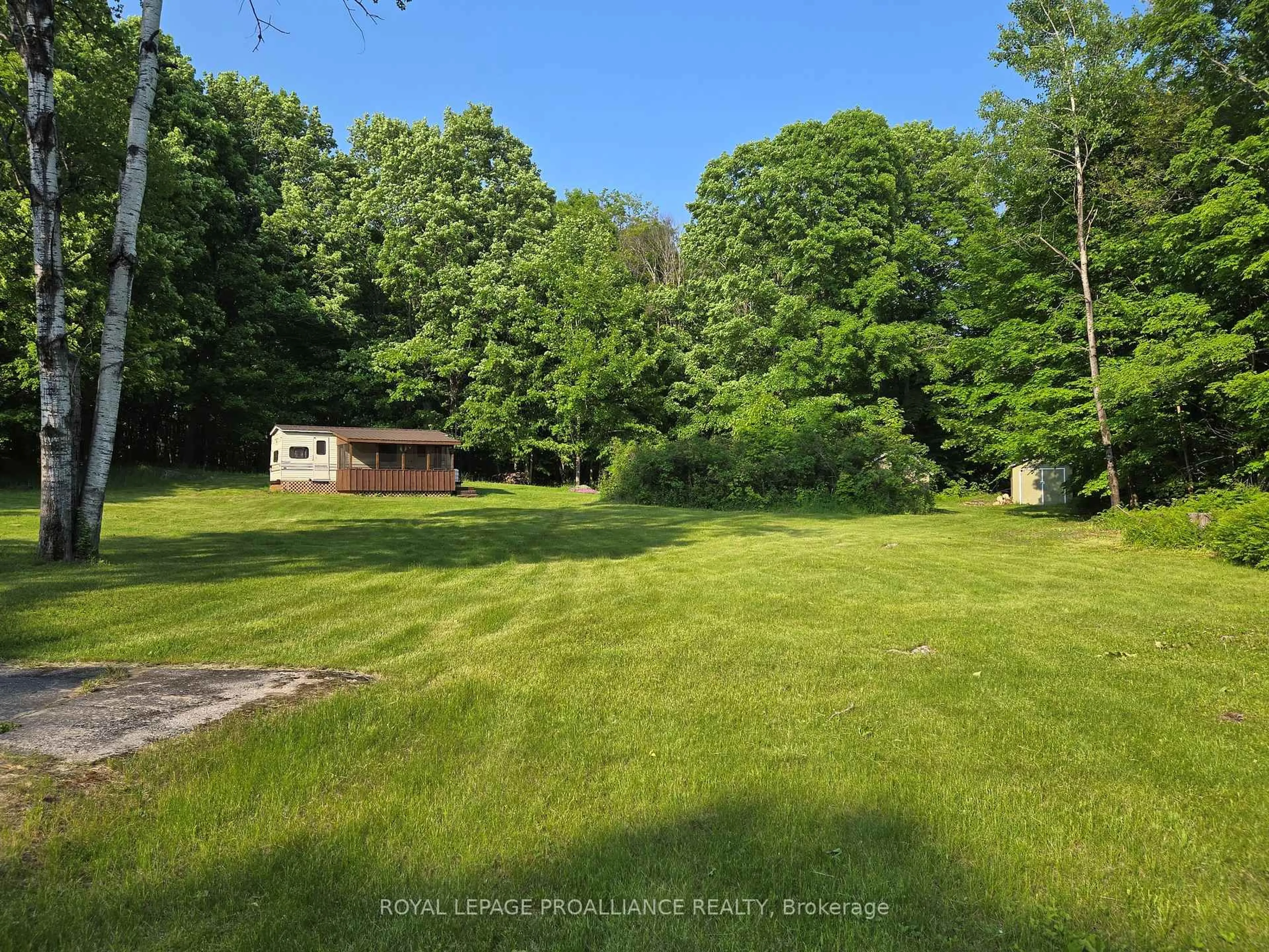 A pic from outside/outdoor area/front of a property/back of a property/a pic from drone, water/lake/river/ocean view for 2476 Henderson Rd, Arden Ontario K0H 1B0