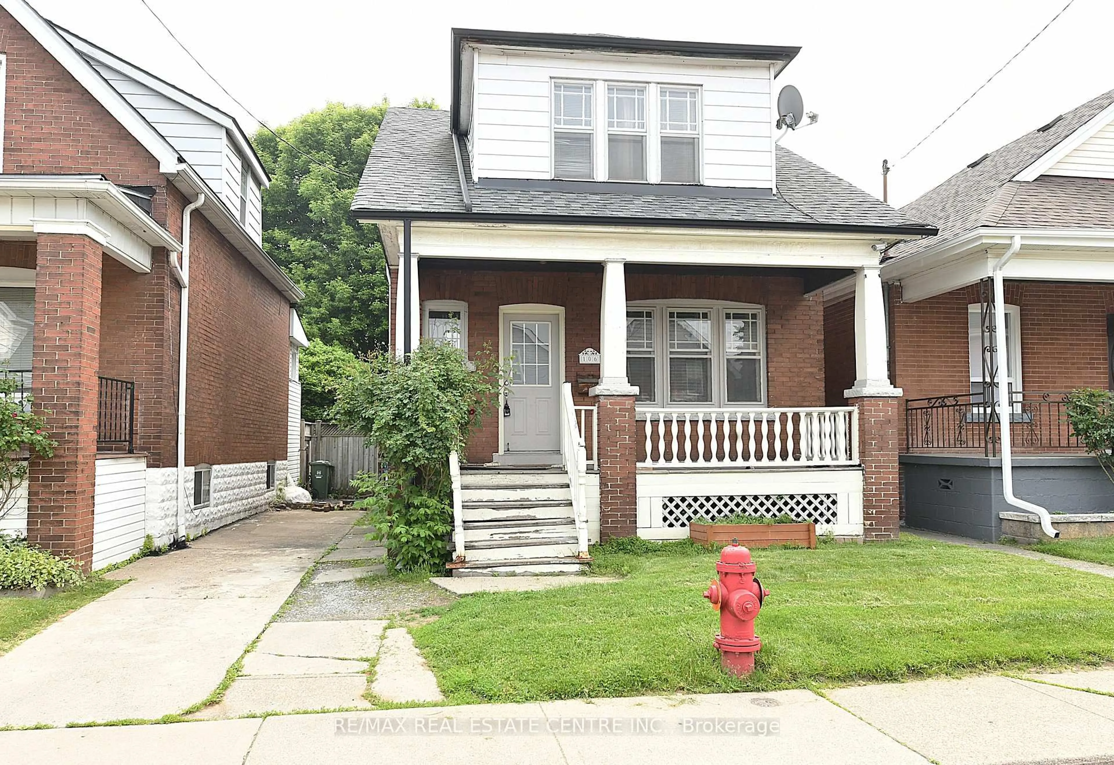 Home with brick exterior material, street for 106 Grosvenor Ave, Hamilton Ontario L8L 7S6