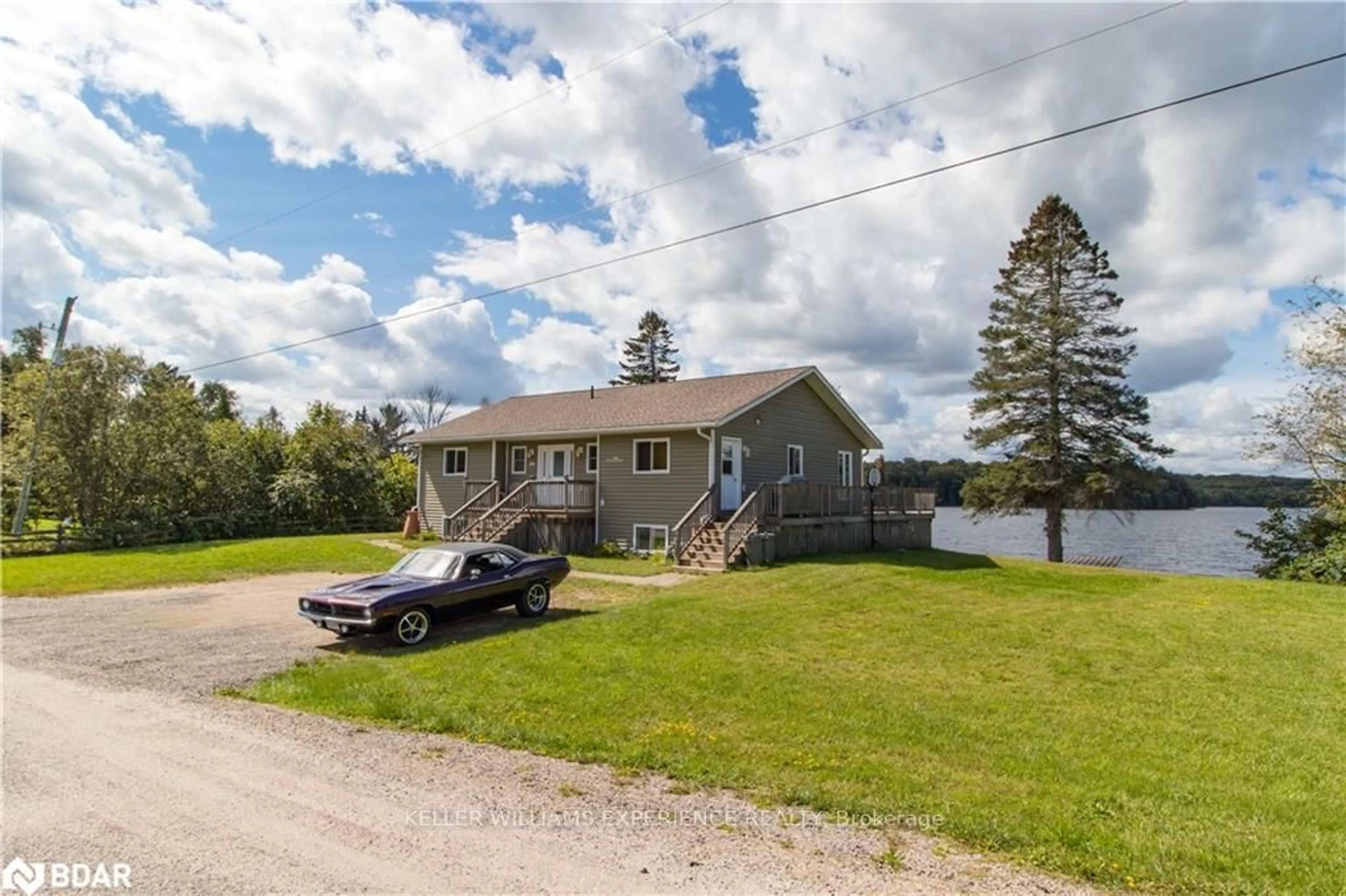 A pic from outside/outdoor area/front of a property/back of a property/a pic from drone, water/lake/river/ocean view for 106 Johnston Rd, Magnetawan Ontario P0A 1P0