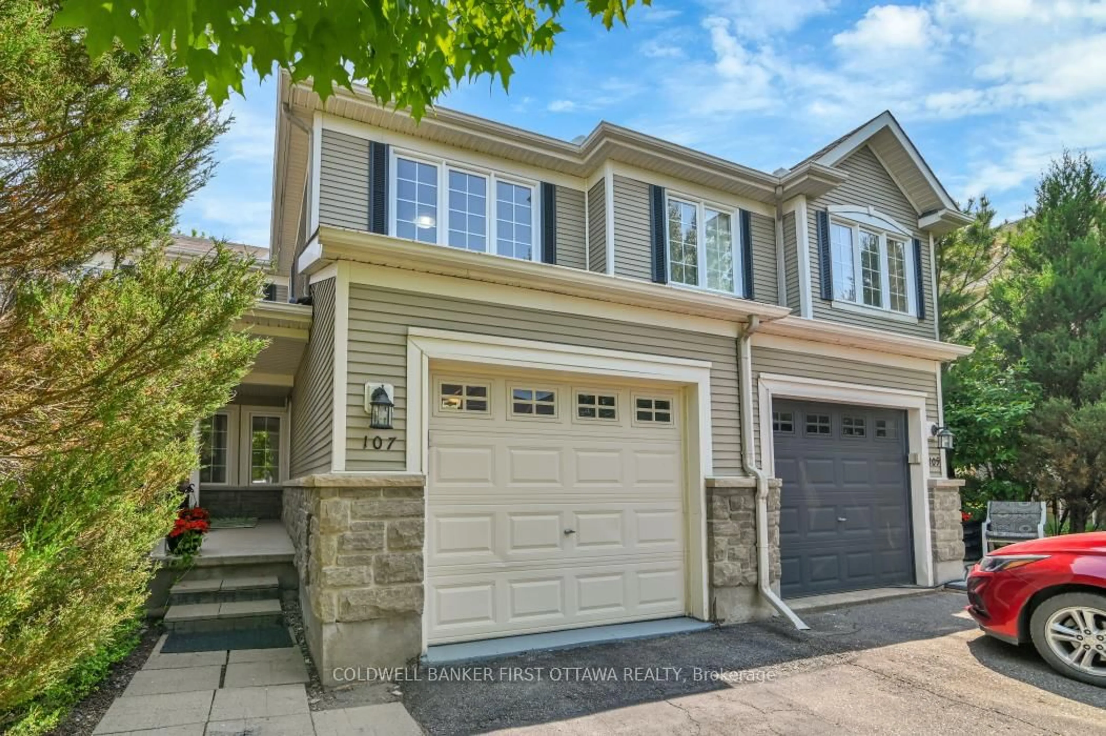 Home with vinyl exterior material, street for 107 Osnabrook Rd, Ottawa Ontario K2J 0G7