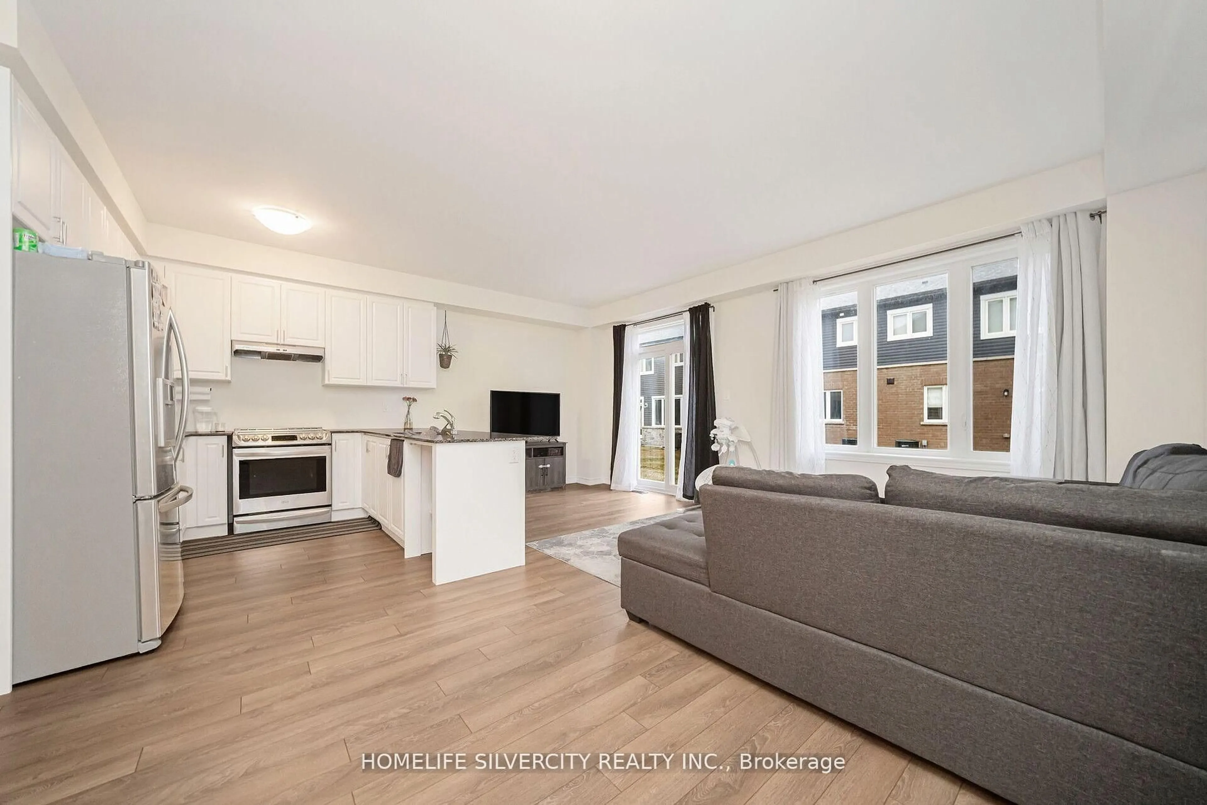 Living room with furniture, wood/laminate floor for 74 Brown St, Erin Ontario N0B 1T0