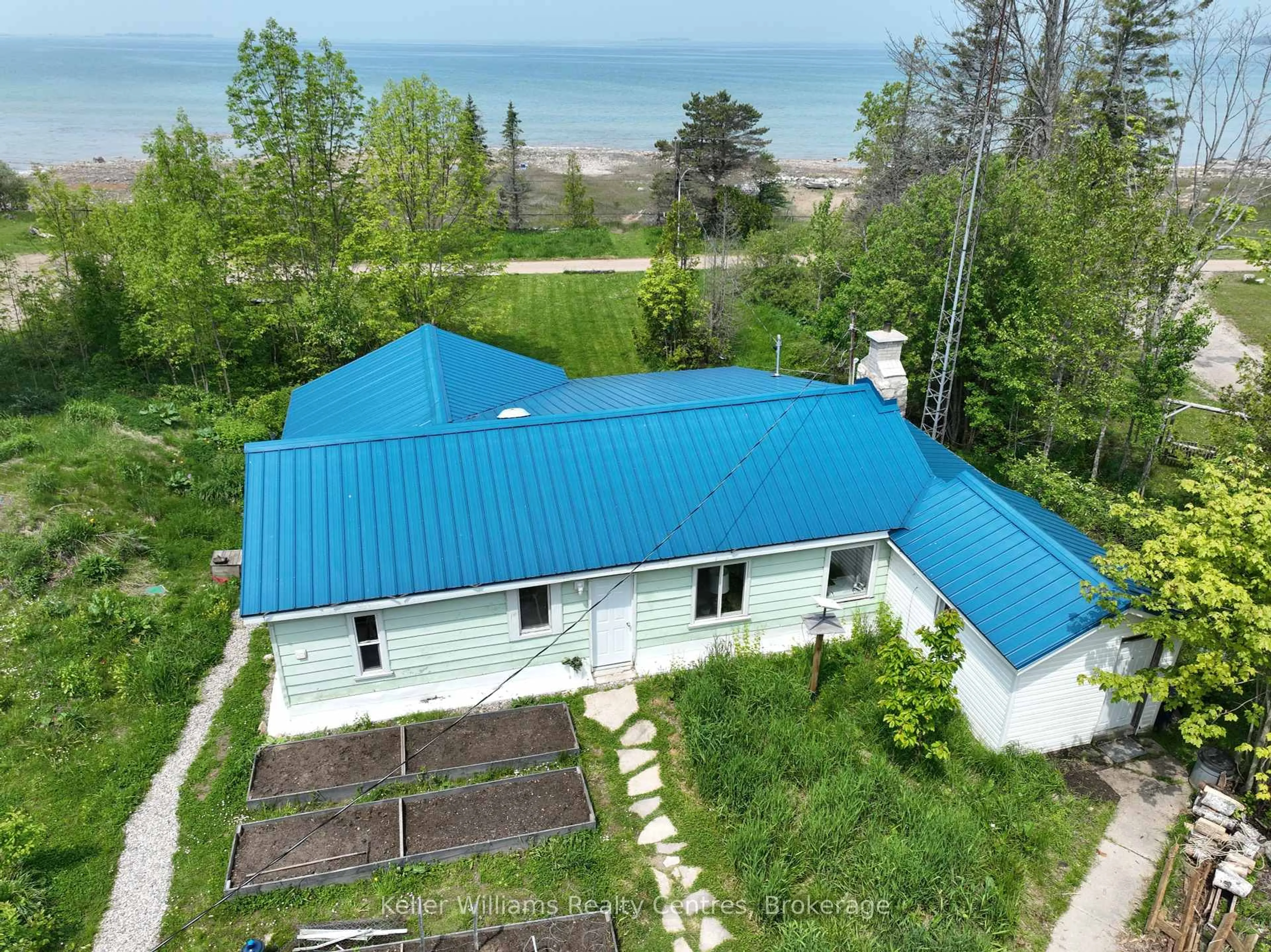 A pic from outside/outdoor area/front of a property/back of a property/a pic from drone, water/lake/river/ocean view for 31 Waterview Rd, South Bruce Peninsula Ontario N0H 2T0
