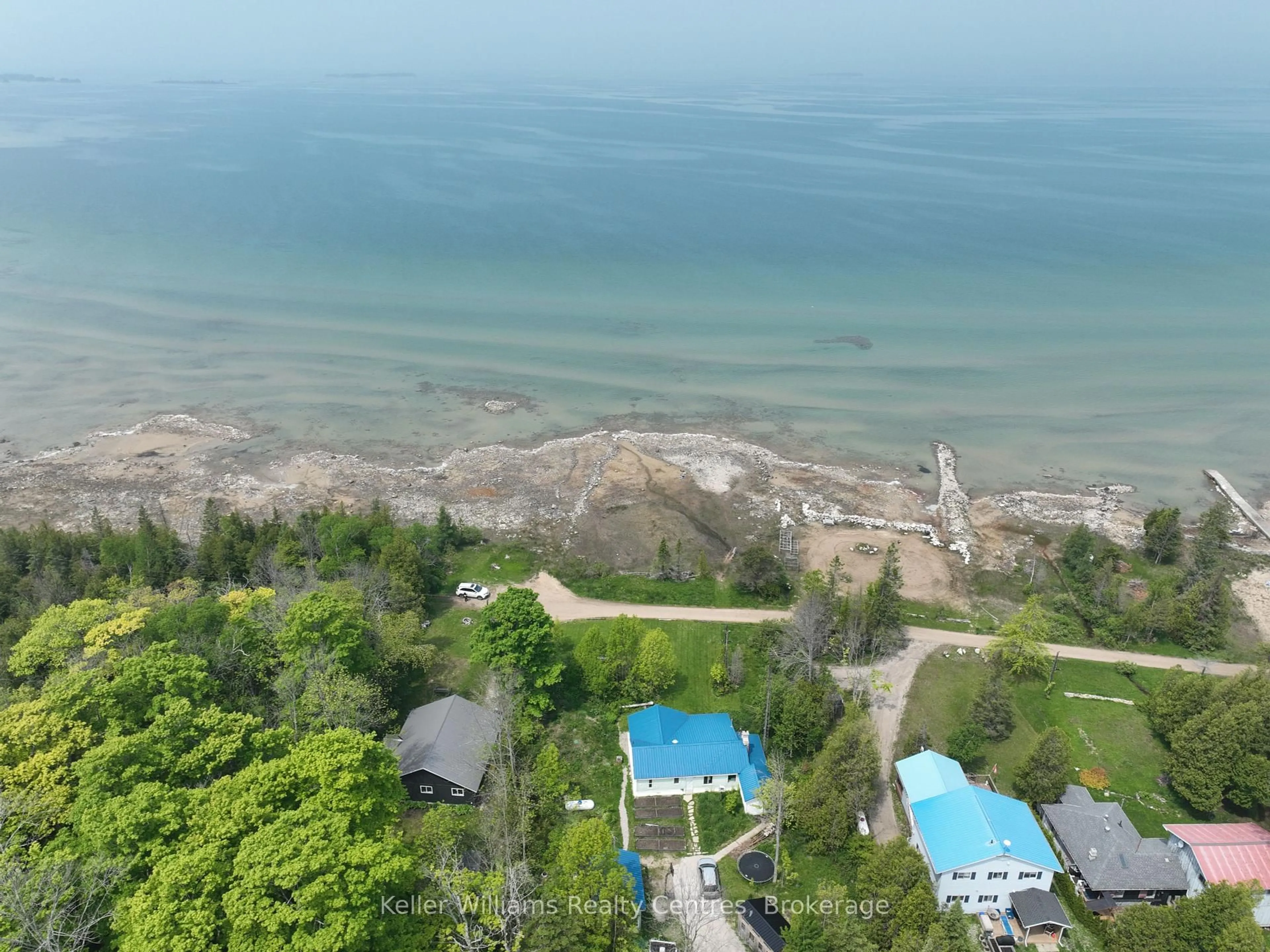 A pic from outside/outdoor area/front of a property/back of a property/a pic from drone, water/lake/river/ocean view for 31 Waterview Rd, South Bruce Peninsula Ontario N0H 2T0