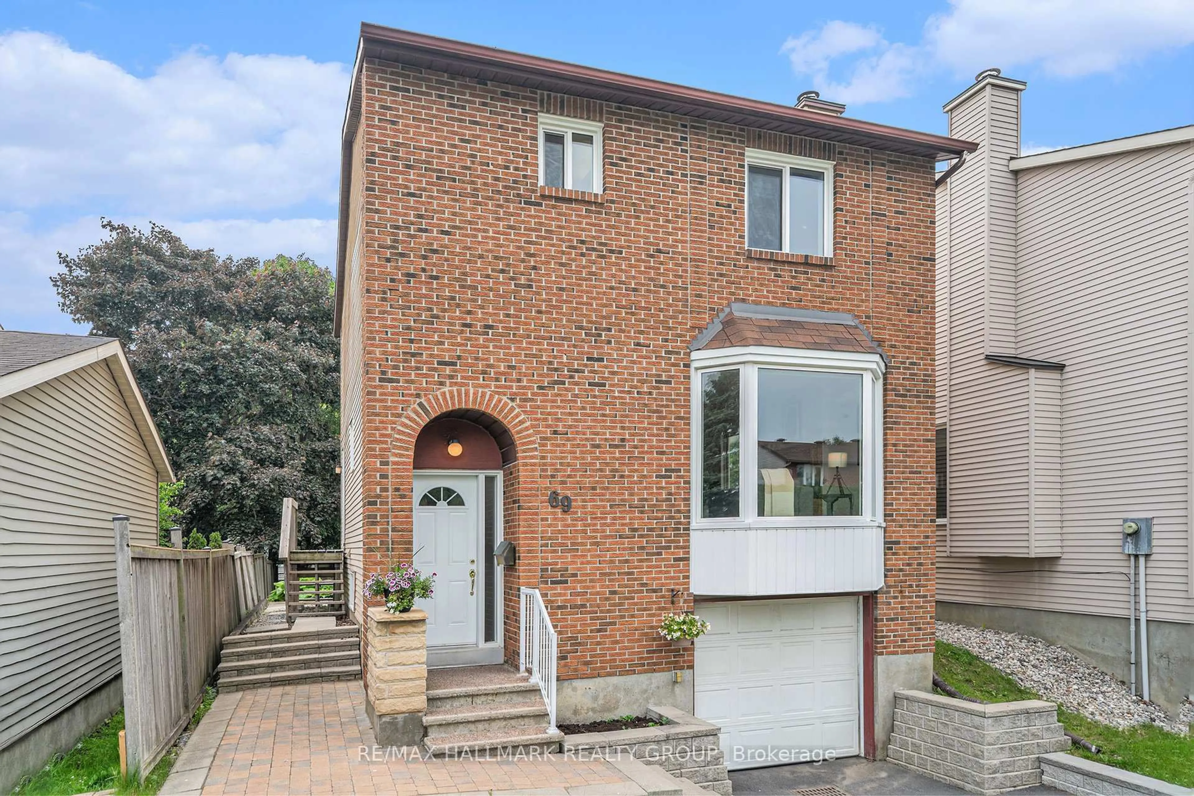 Home with brick exterior material, street for 69 Farm Gate Cres, Ottawa Ontario K2E 7N3