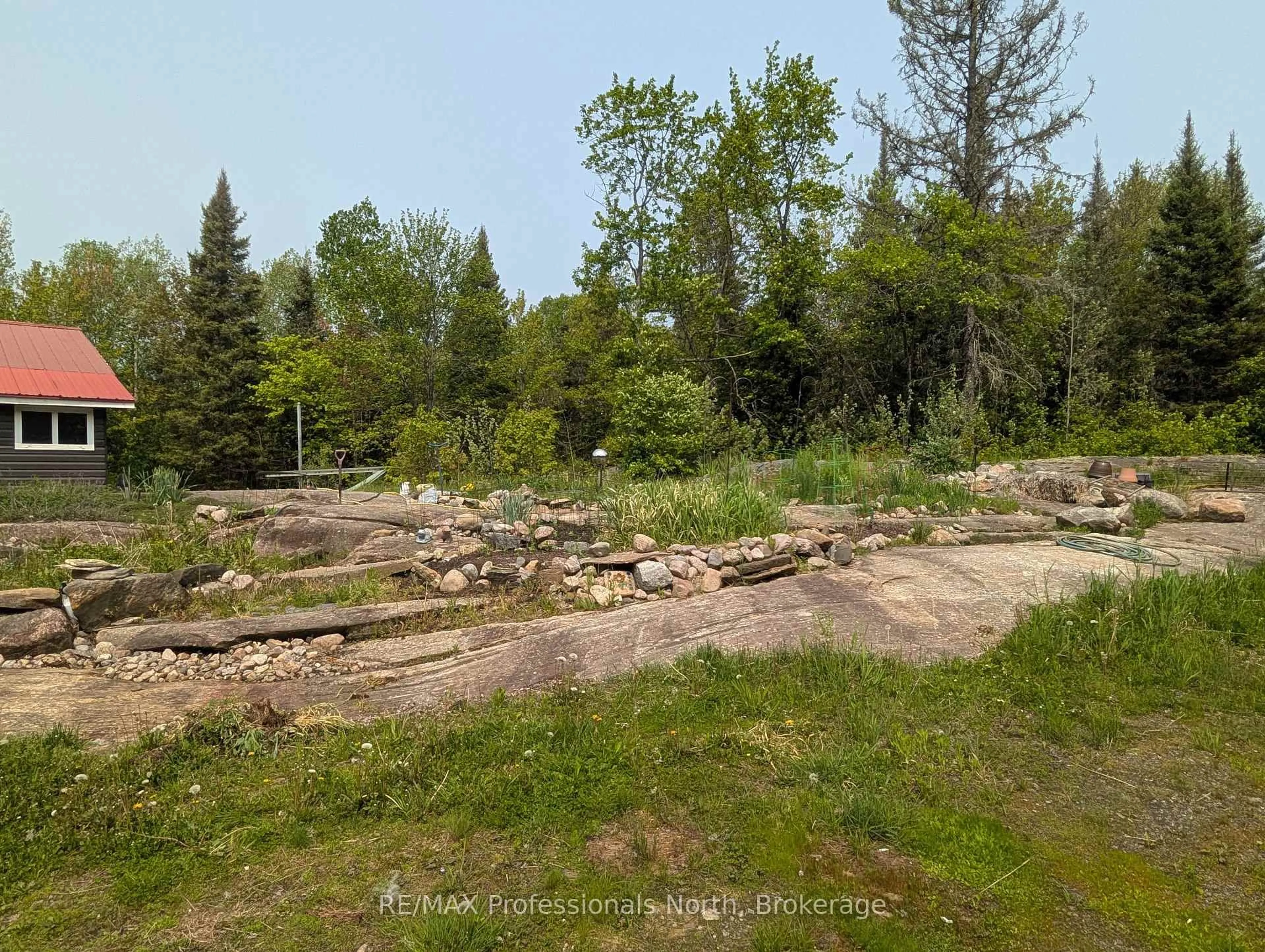 A pic from outside/outdoor area/front of a property/back of a property/a pic from drone, forest/trees view for 1408 Pearceley Rd, Parry Sound Remote Area Ontario P0A 1Z0