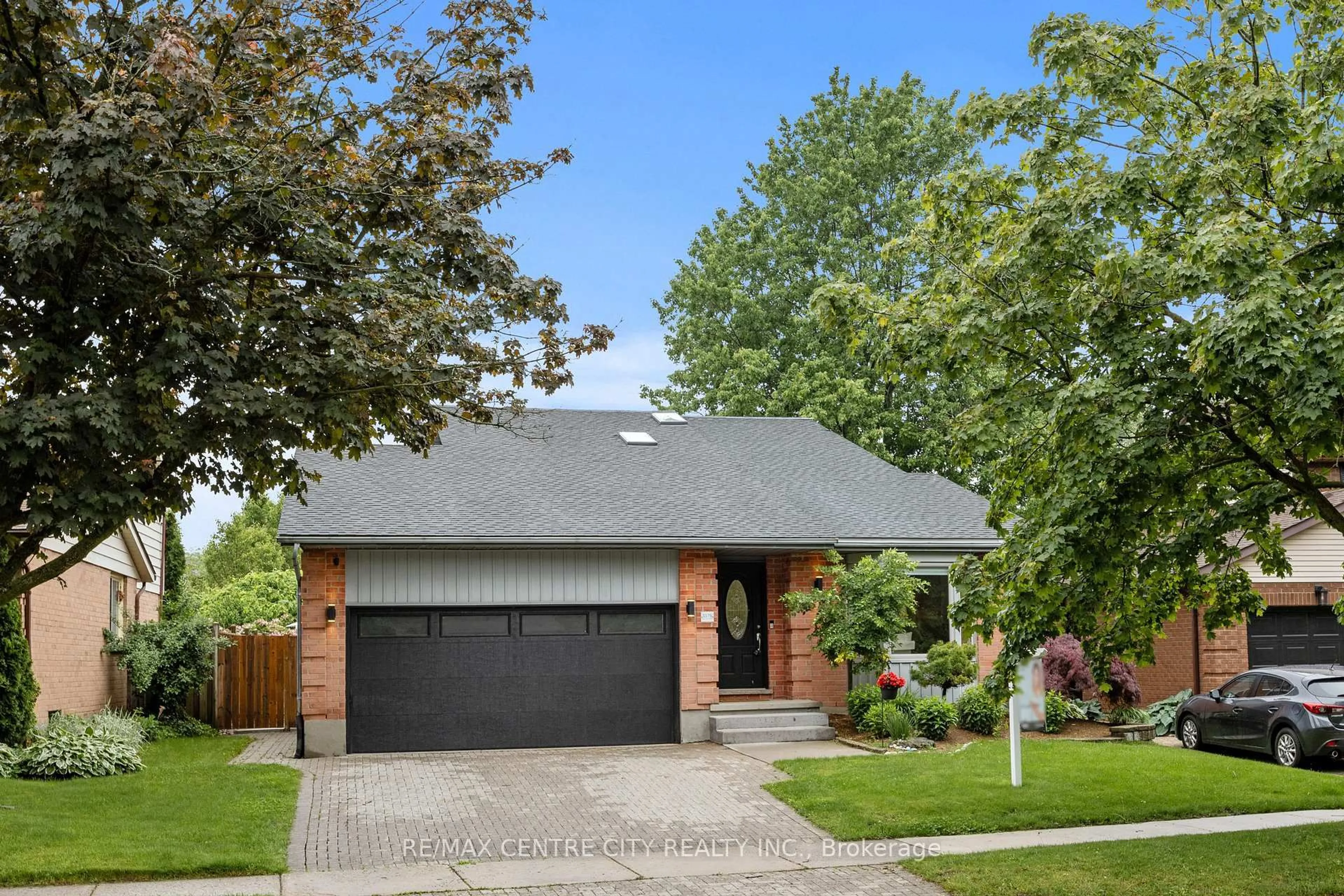 Home with brick exterior material, street for 1175 Glenora Dr, London North Ontario N5X 2P6
