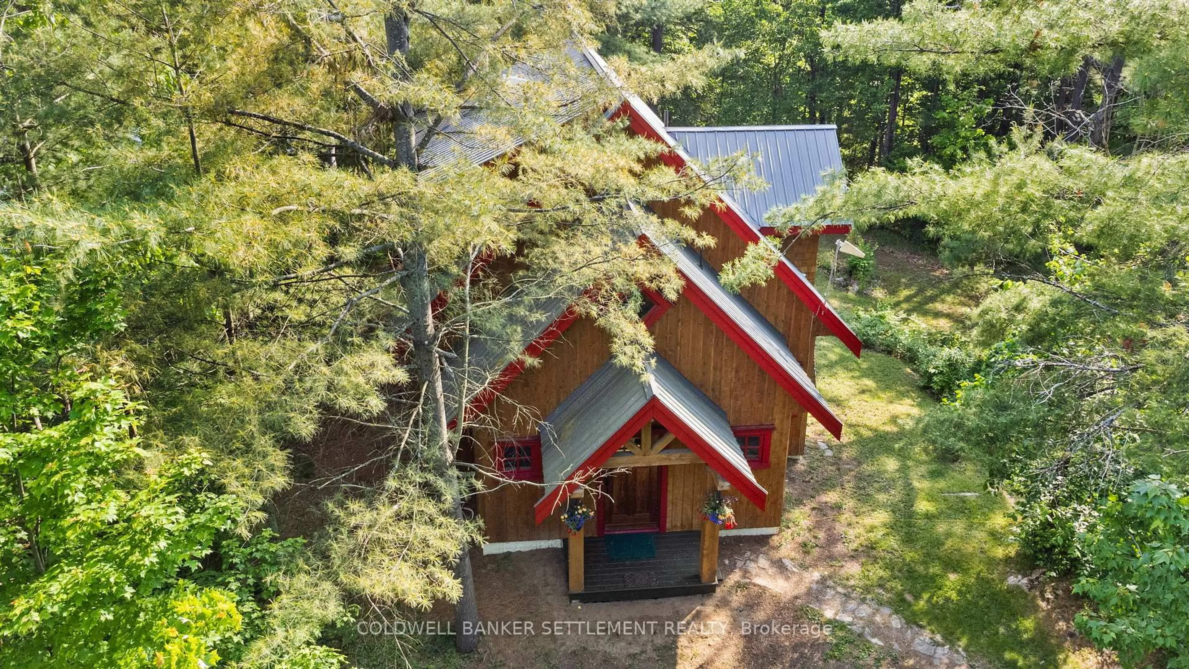 A pic from outside/outdoor area/front of a property/back of a property/a pic from drone, forest/trees view for 1093 Althorpe Rd, Tay Valley Ontario K7H 3R9