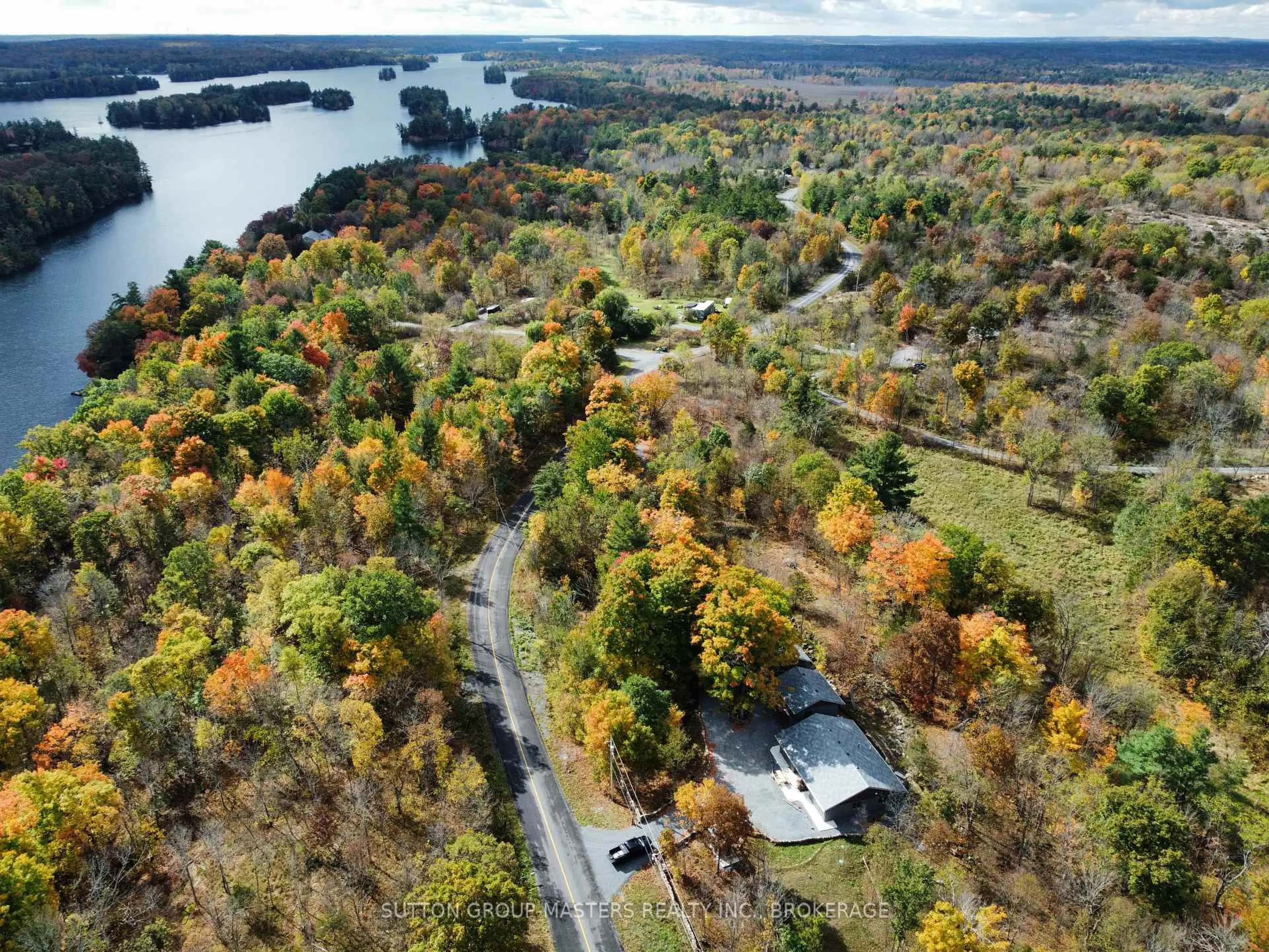 A pic from outside/outdoor area/front of a property/back of a property/a pic from drone, water/lake/river/ocean view for 6179 NORTH SHORE Rd, Perth Road Ontario K0H 2L0
