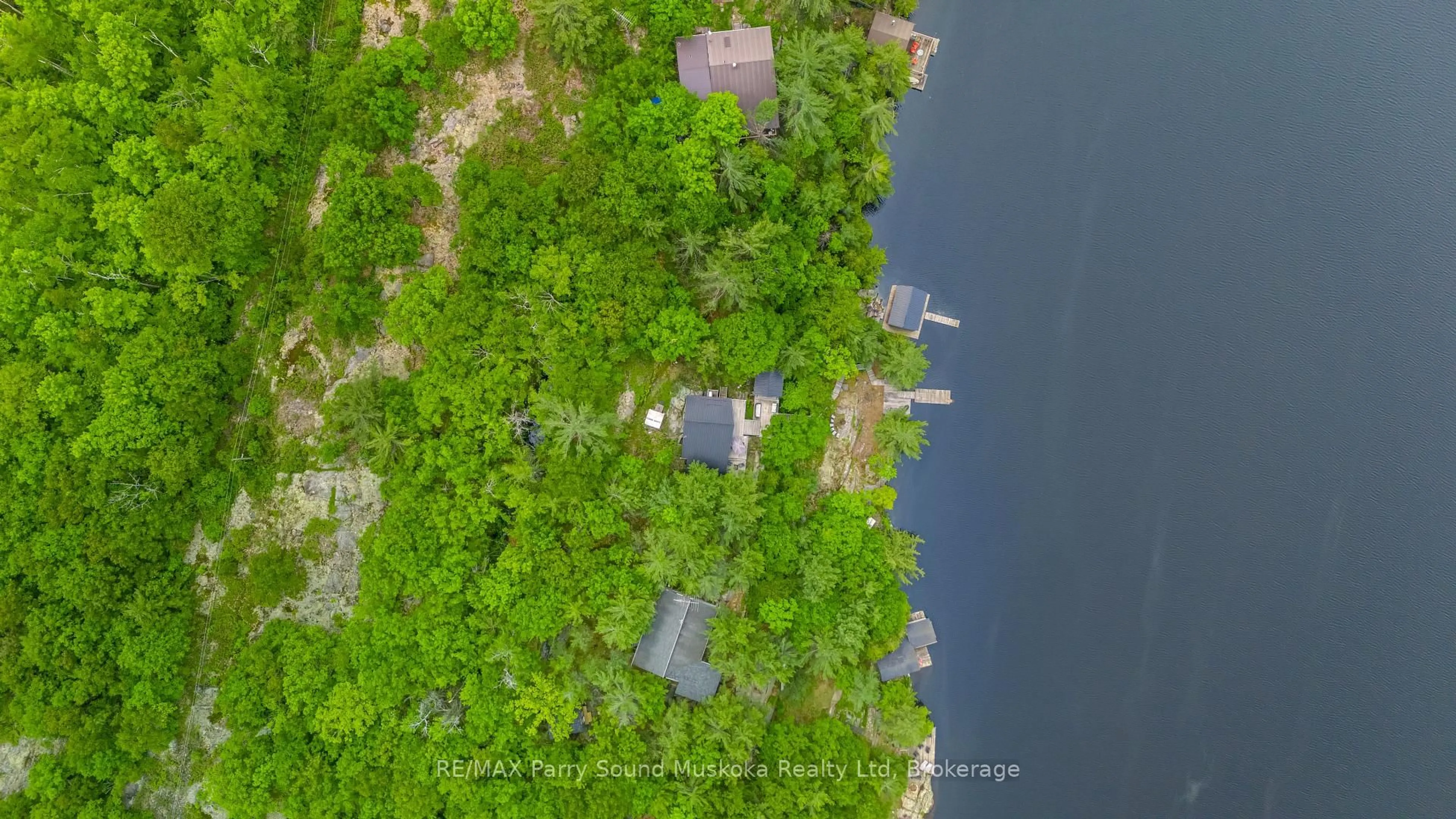 A pic from outside/outdoor area/front of a property/back of a property/a pic from drone, water/lake/river/ocean view for 109 Healey Lake, The Archipelago Ontario P0G 1G0