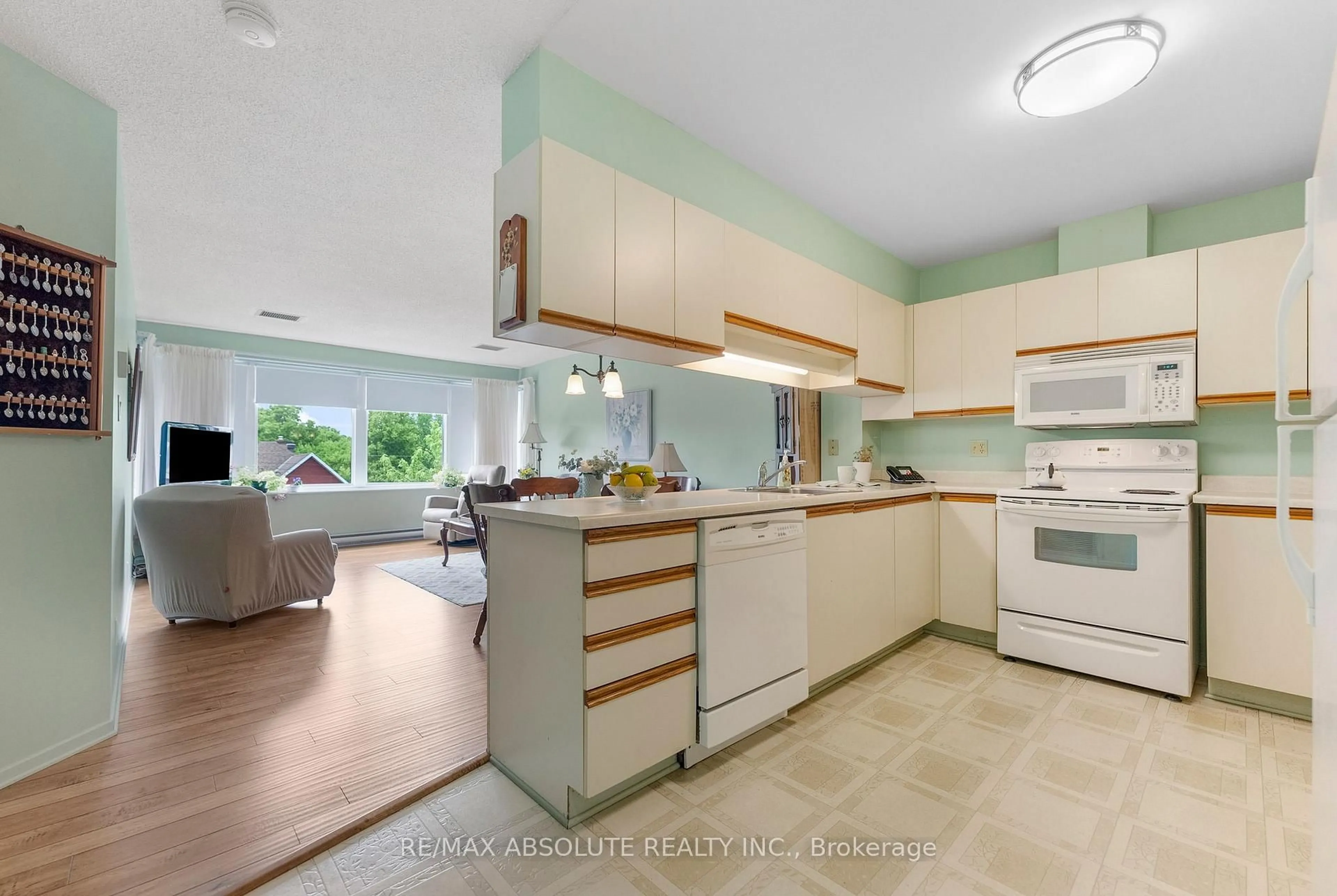 Open concept kitchen, ceramic/tile floor for 124 Daniel St #301, Arnprior Ontario K7S 2L7