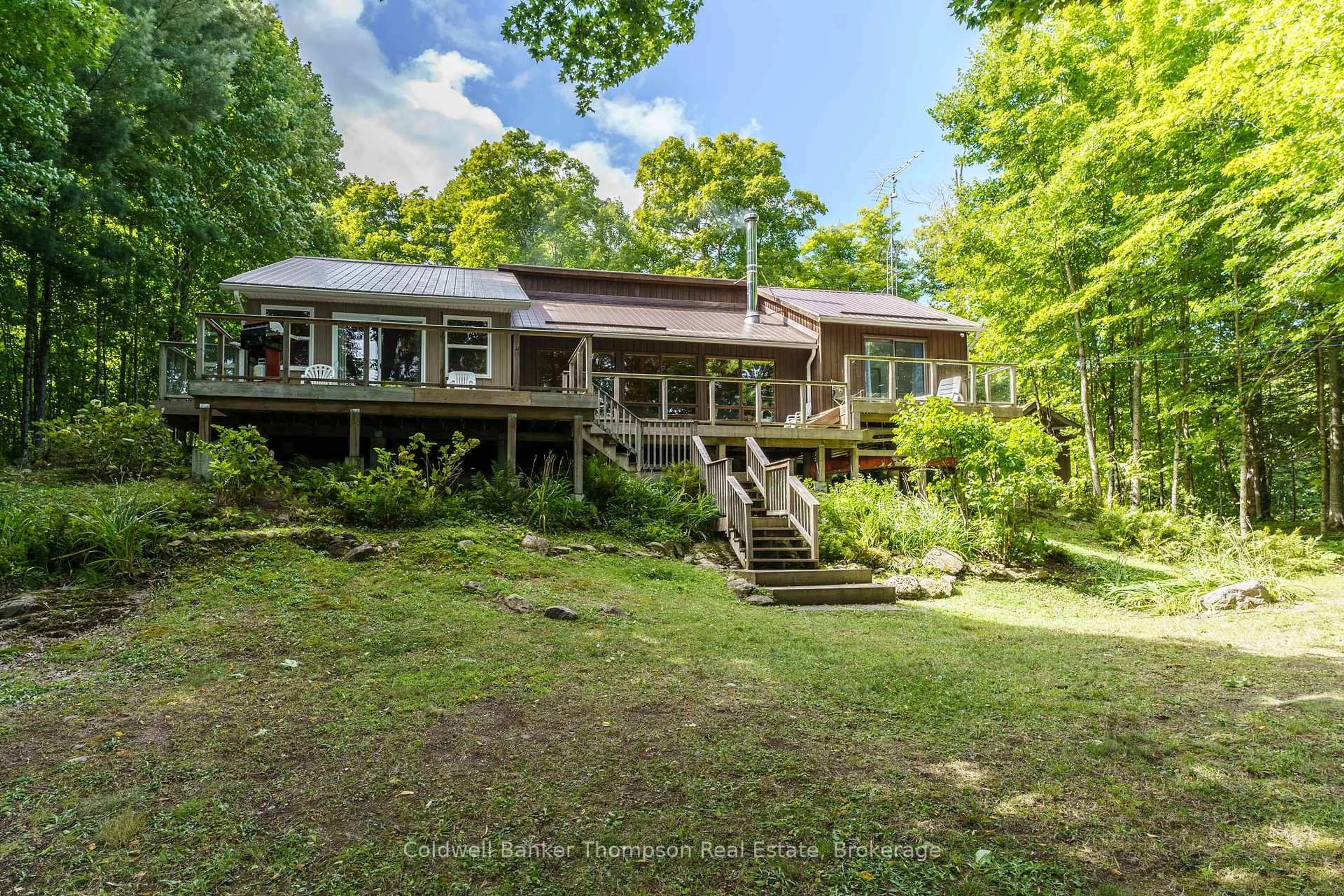A pic from outside/outdoor area/front of a property/back of a property/a pic from drone, water/lake/river/ocean view for 115 Sandwood Dr, Burk's Falls Ontario P0A 1C0