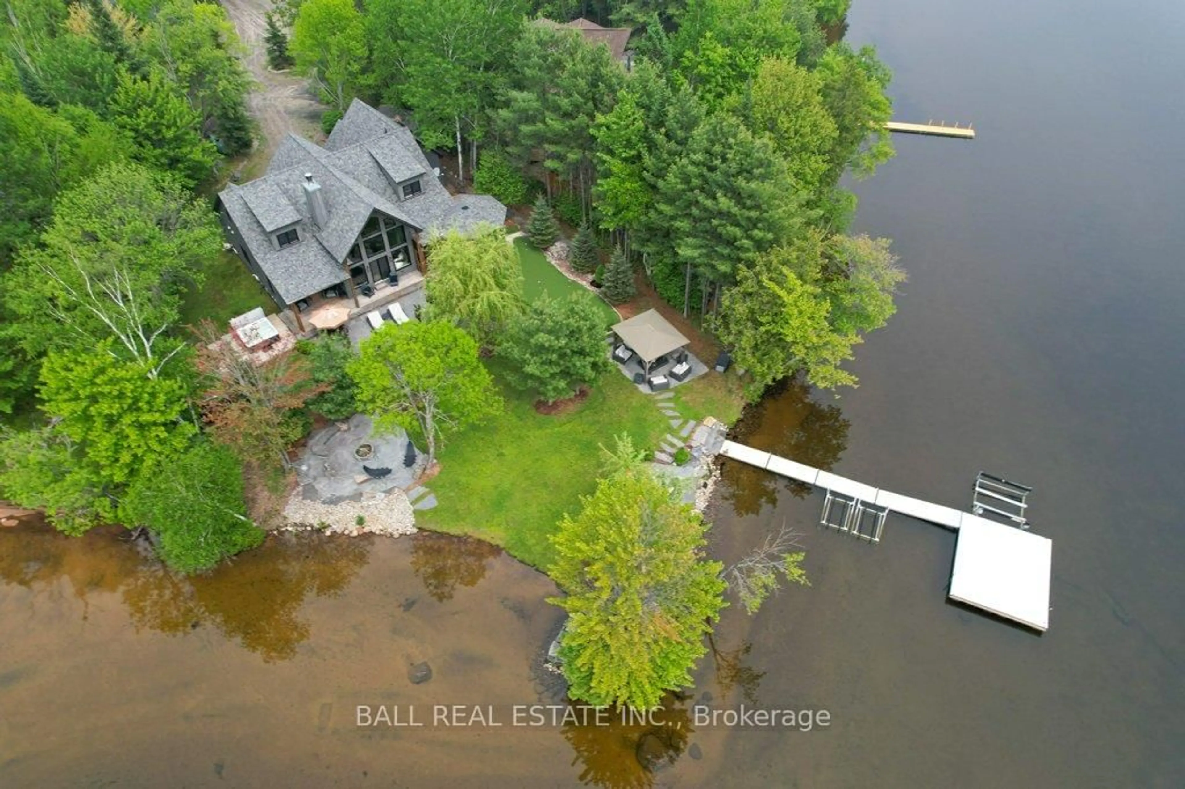 A pic from outside/outdoor area/front of a property/back of a property/a pic from drone, water/lake/river/ocean view for 1856 BLUEBERRY Tr, Dysart et al Ontario K0M 1S0