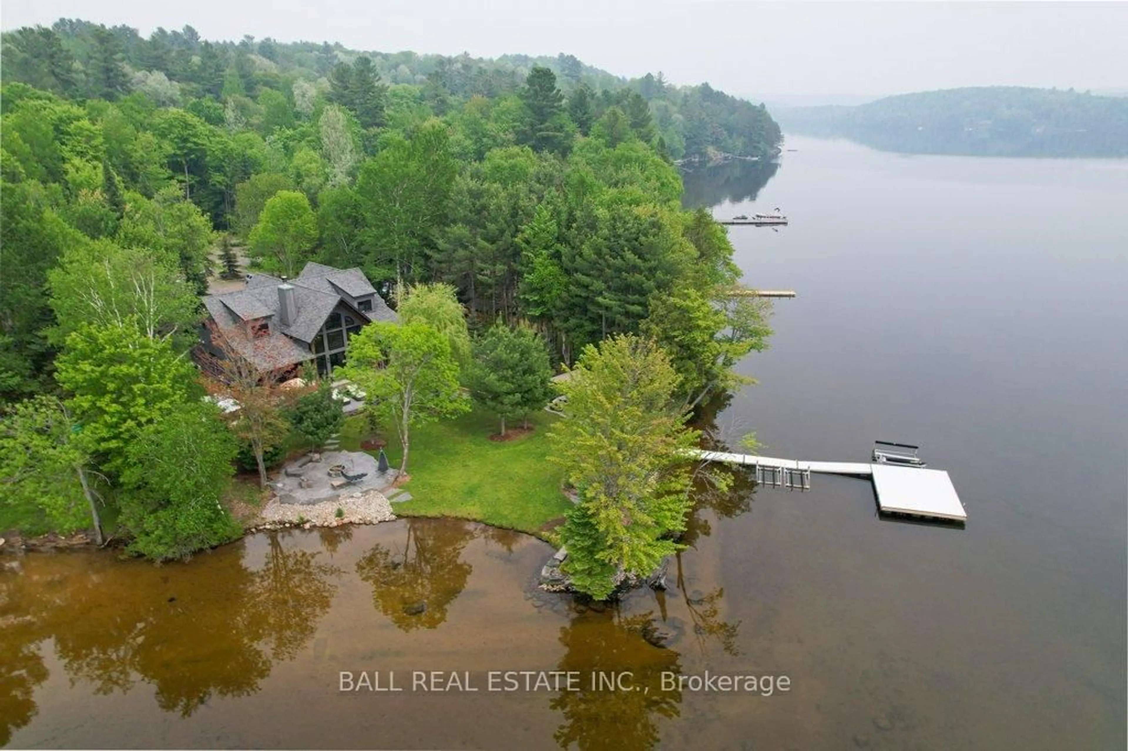 A pic from outside/outdoor area/front of a property/back of a property/a pic from drone, water/lake/river/ocean view for 1856 BLUEBERRY Tr, Dysart et al Ontario K0M 1S0