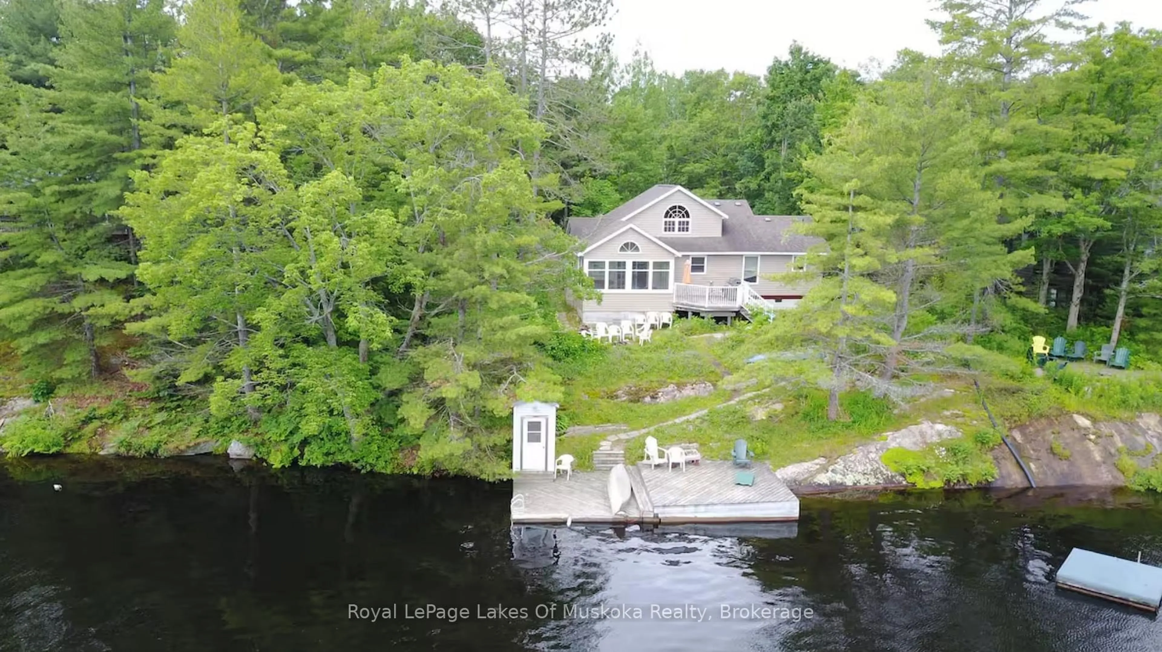 A pic from outside/outdoor area/front of a property/back of a property/a pic from drone, water/lake/river/ocean view for 49 Pinetree Rd, Gravenhurst Ontario P1P 1R2