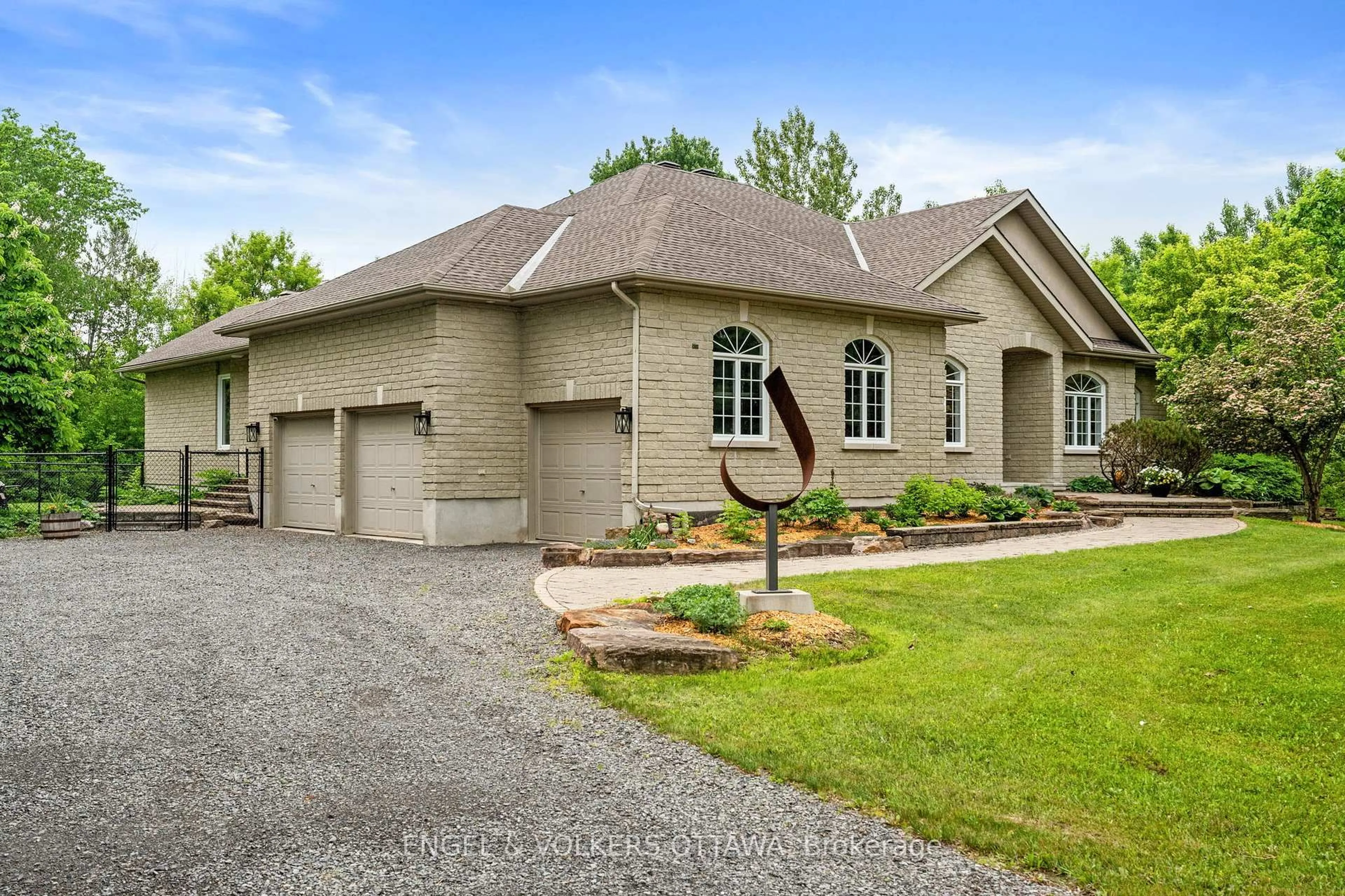 Home with brick exterior material, street for 6196 Elkwood Dr, Ottawa Ontario K4P 1M9