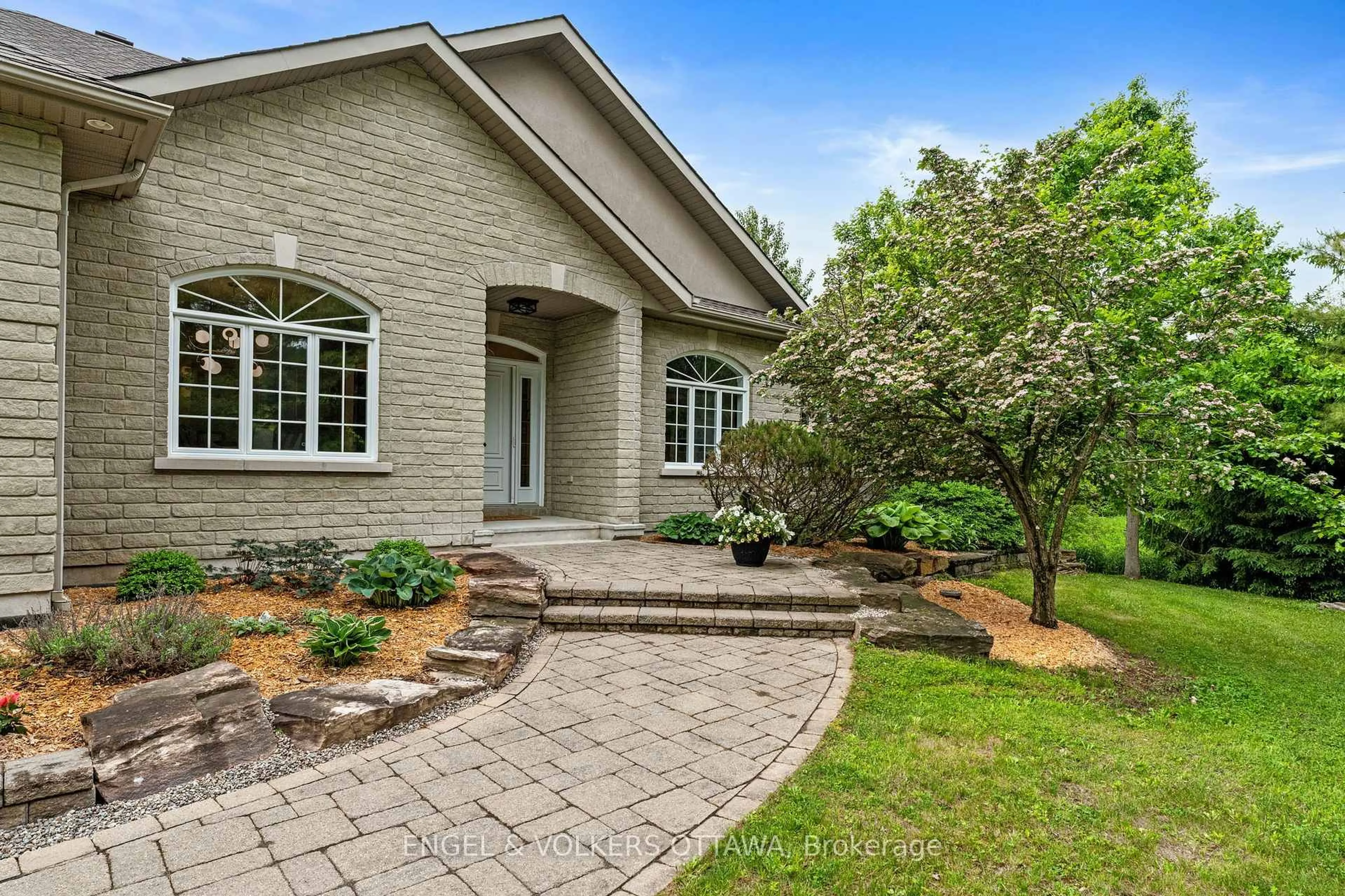 Home with brick exterior material, street for 6196 Elkwood Dr, Ottawa Ontario K4P 1M9