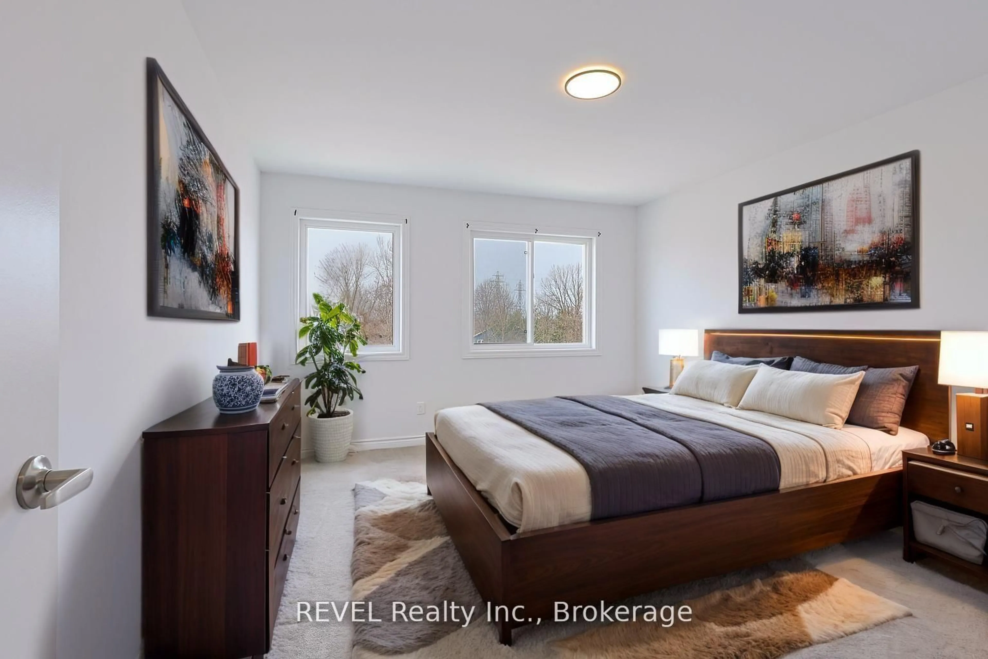 Bedroom with bed, ceramic/tile floor for 139 Caroline St, Welland Ontario L3B 0K1