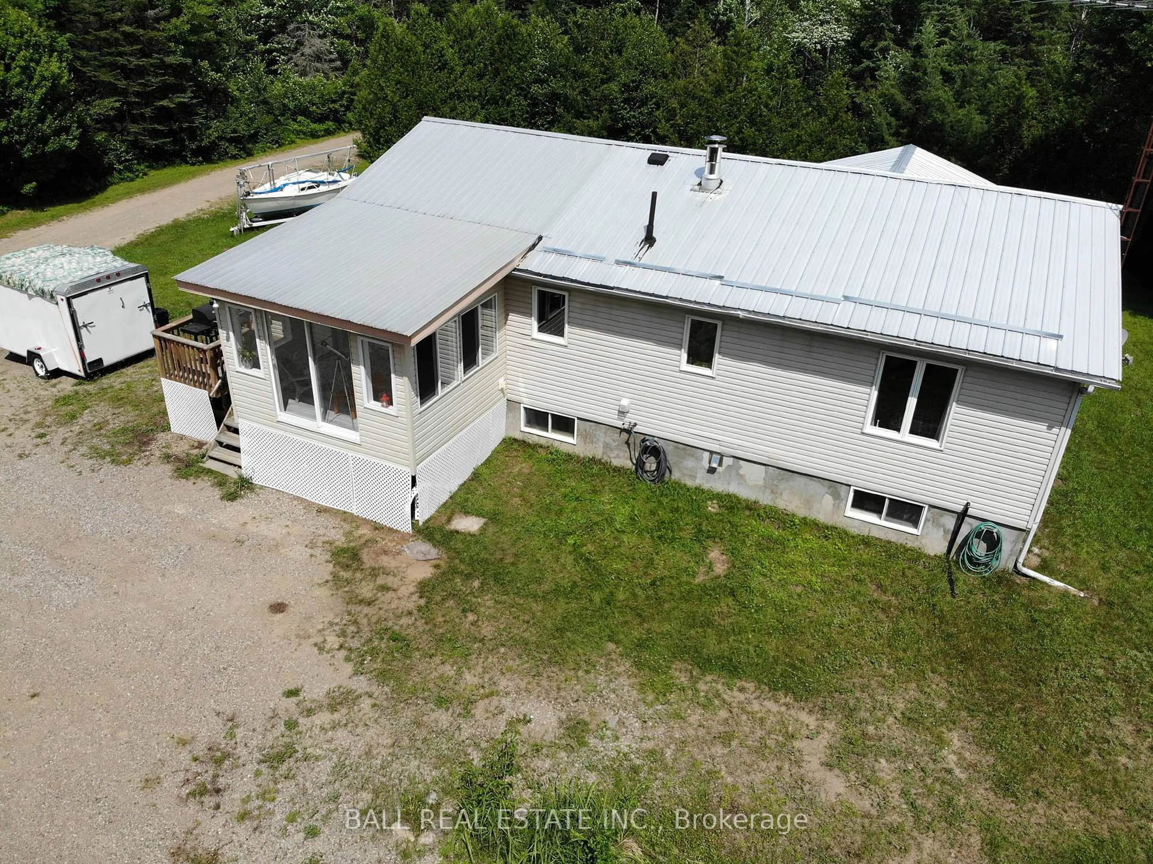 A pic from outside/outdoor area/front of a property/back of a property/a pic from drone, building for 7113 Highway 127, South Algonquin Ontario K0J 2M0