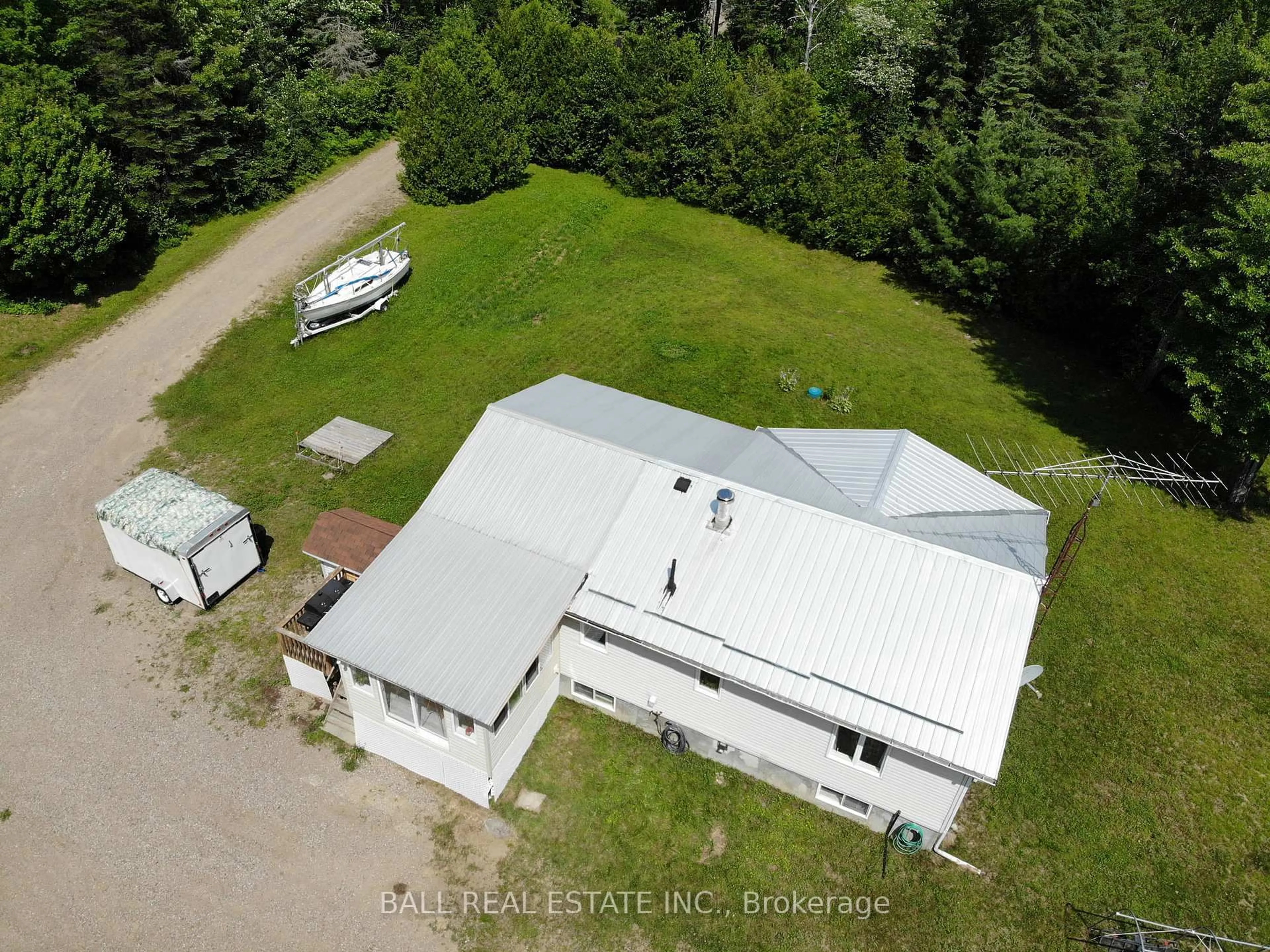 A pic from outside/outdoor area/front of a property/back of a property/a pic from drone, building for 7113 Highway 127, South Algonquin Ontario K0J 2M0