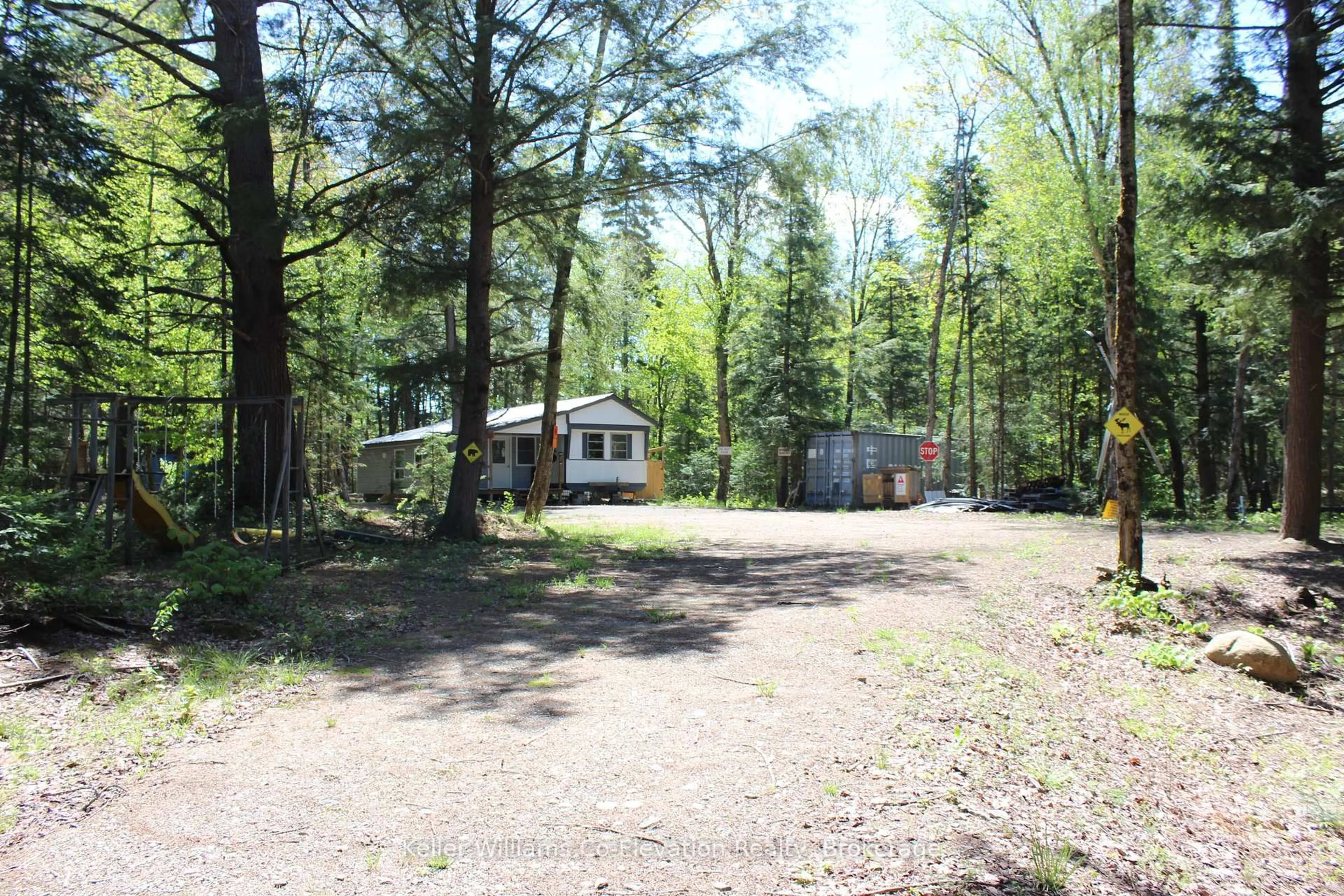 A pic from outside/outdoor area/front of a property/back of a property/a pic from drone, forest/trees view for 4313 Highway 518, McMurrich/Monteith Ontario P0A 1C0