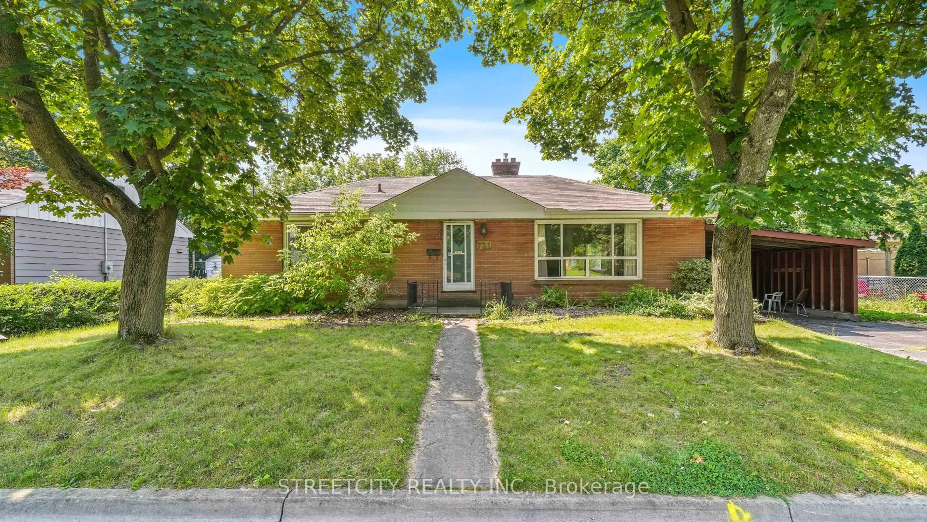 Home with brick exterior material, street for 711 Victoria St, London East Ontario N5Y 4C5