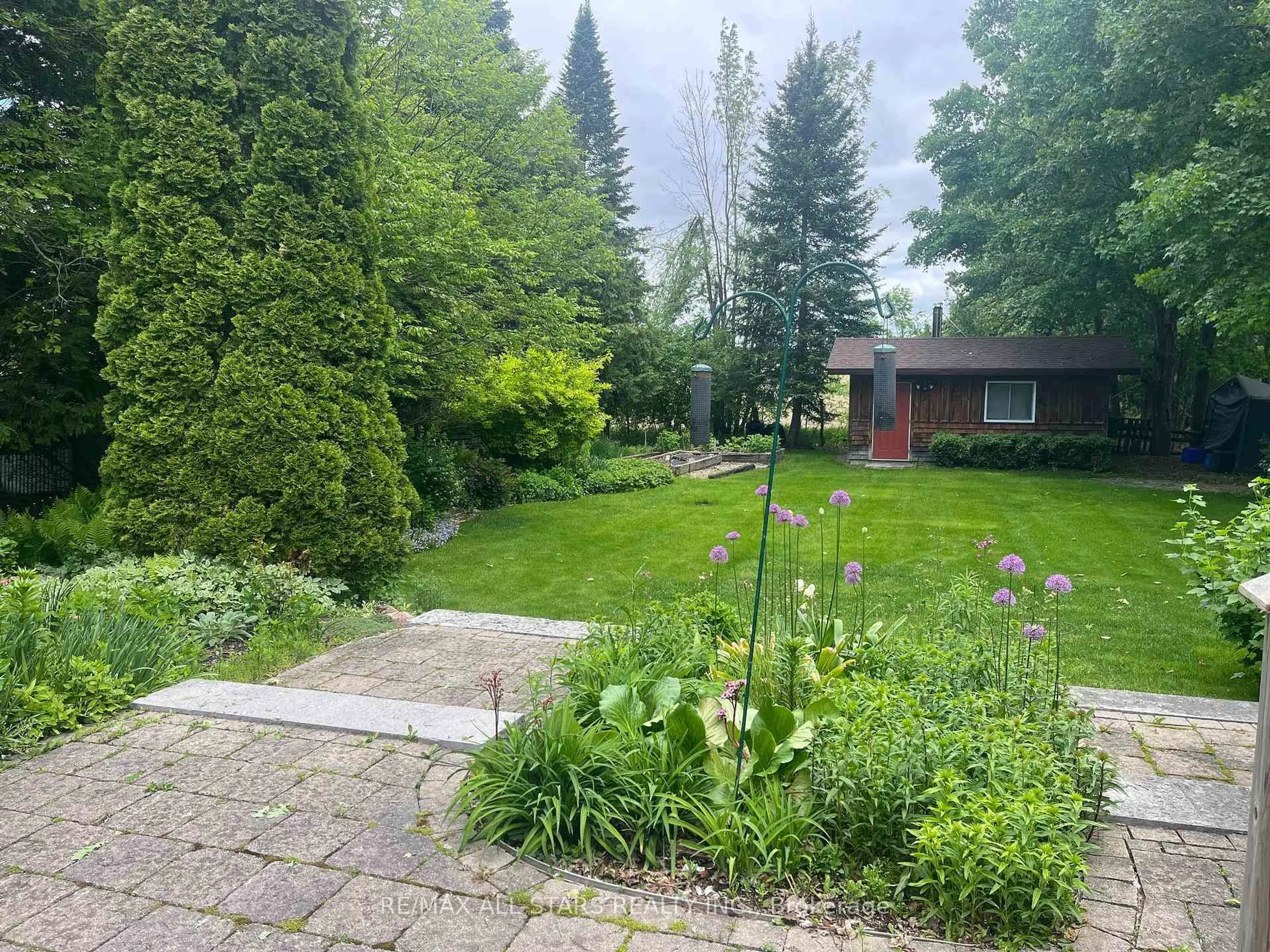 A pic from outside/outdoor area/front of a property/back of a property/a pic from drone, forest/trees view for 690 Post Rd, Kawartha Lakes Ontario K0L 2X0