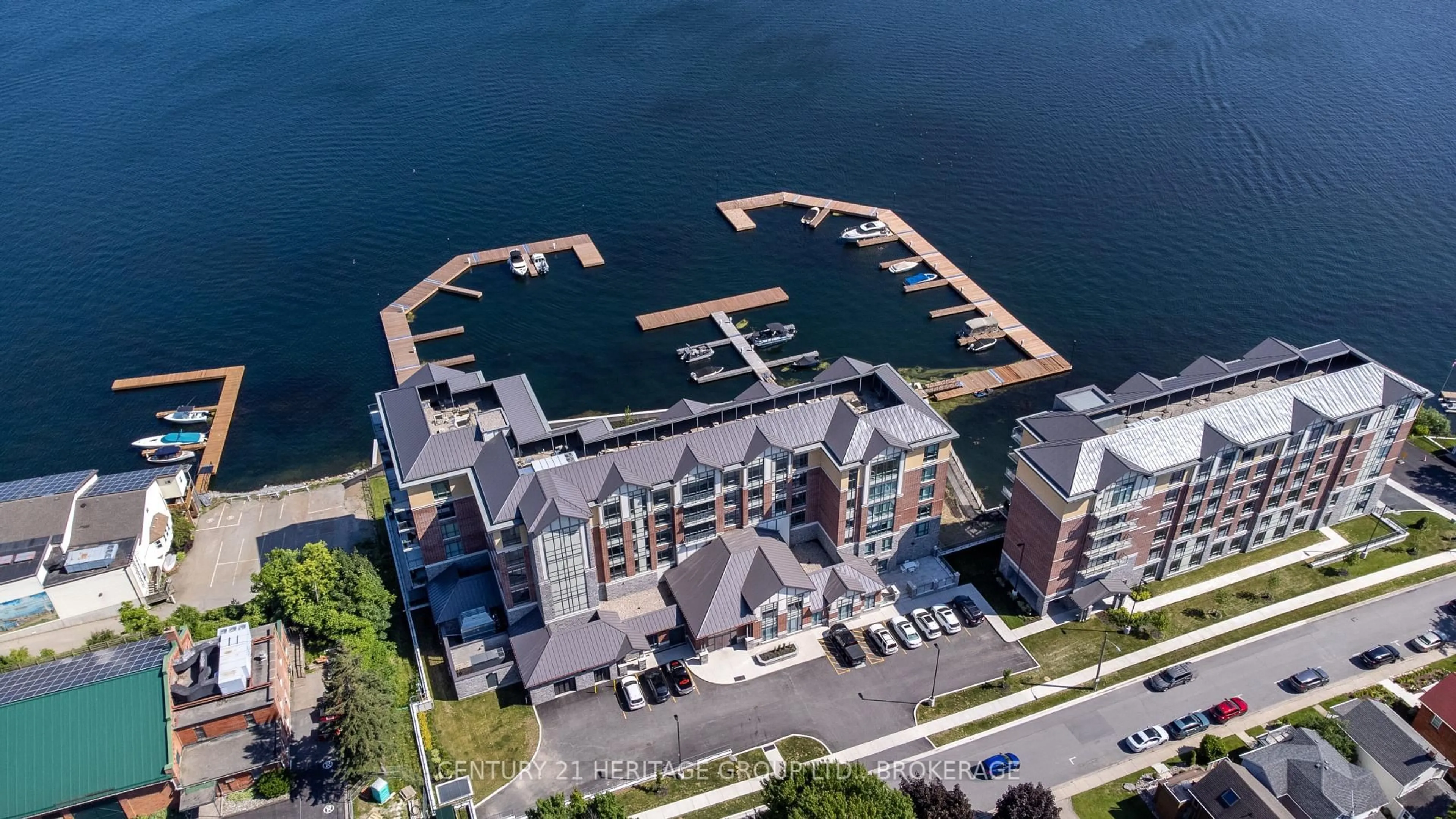 A pic from outside/outdoor area/front of a property/back of a property/a pic from drone, water/lake/river/ocean view for 129 South St #510, Gananoque Ontario K7G 0B1