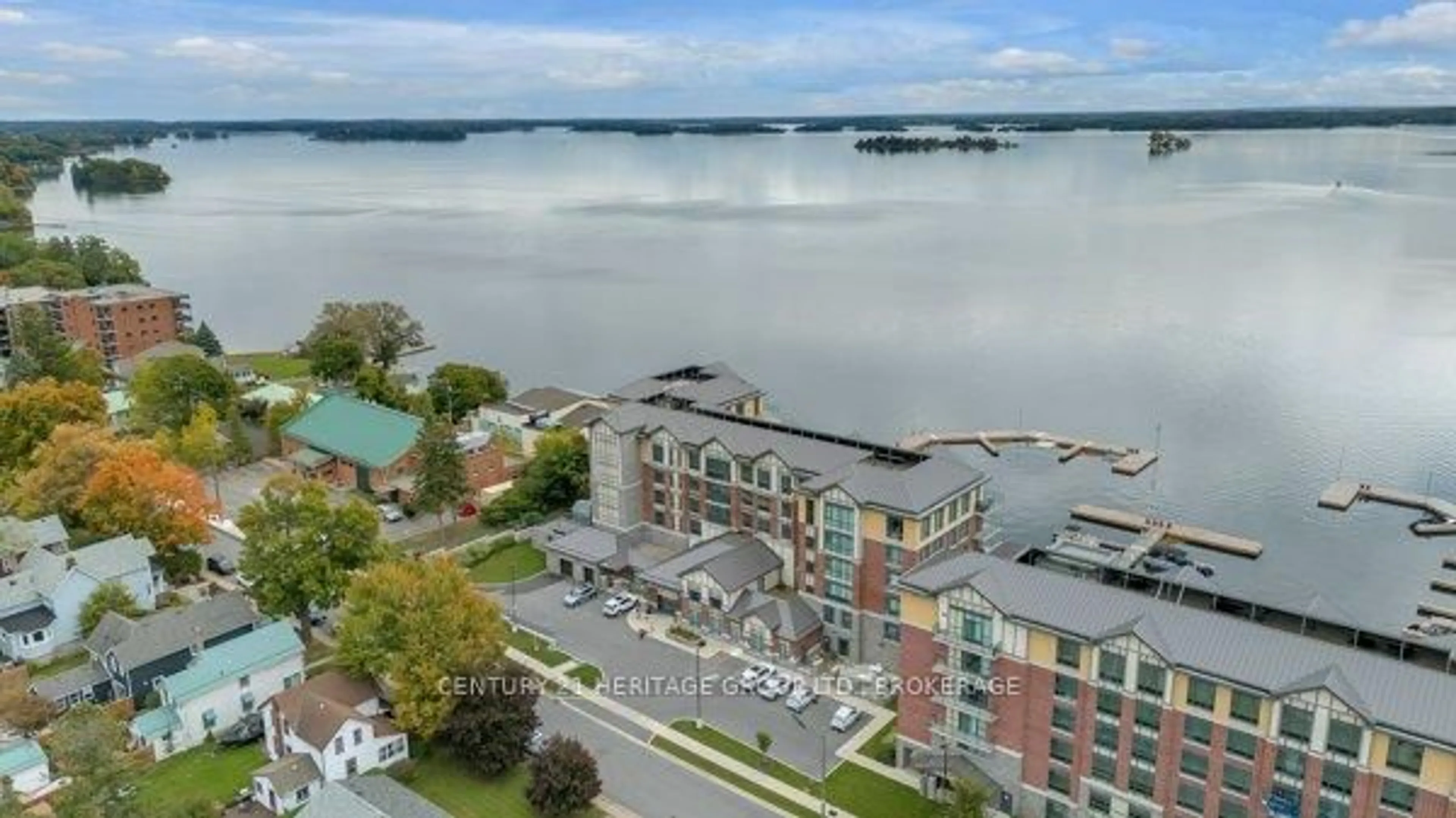 A pic from outside/outdoor area/front of a property/back of a property/a pic from drone, water/lake/river/ocean view for 129 South St #510, Gananoque Ontario K7G 0B1