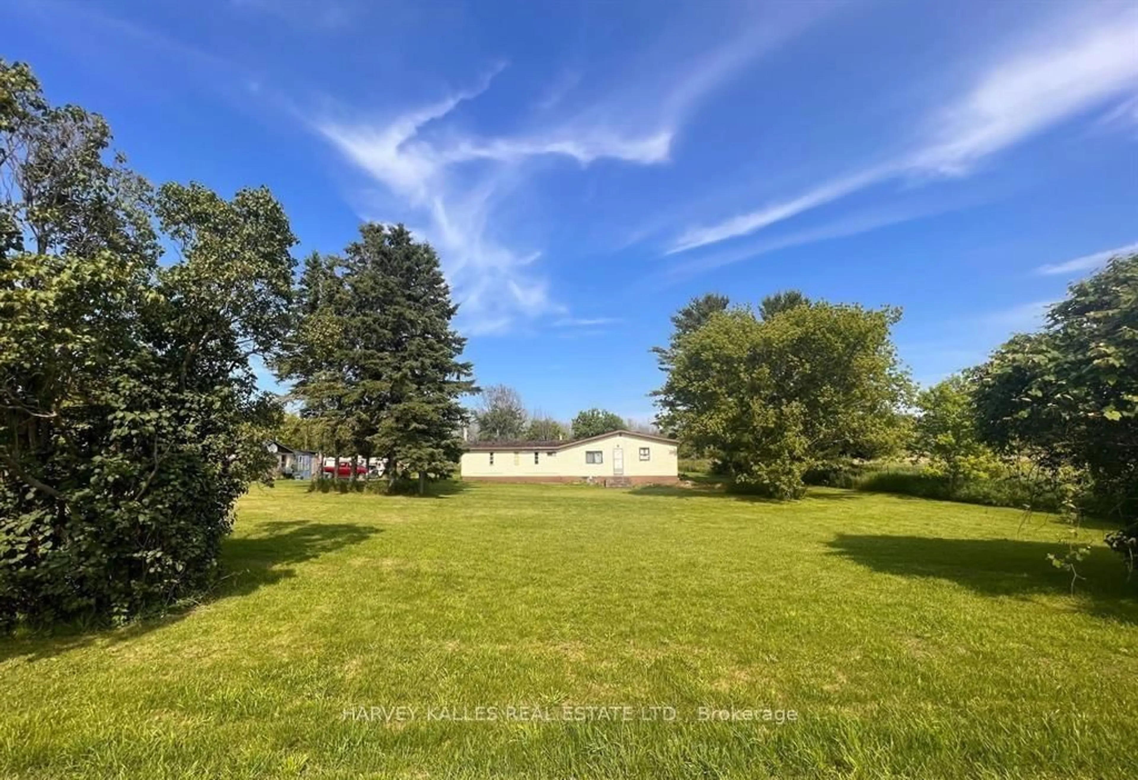A pic from outside/outdoor area/front of a property/back of a property/a pic from drone, unknown for 308 Quaker Rd, Prince Edward County Ontario K0K 1G0