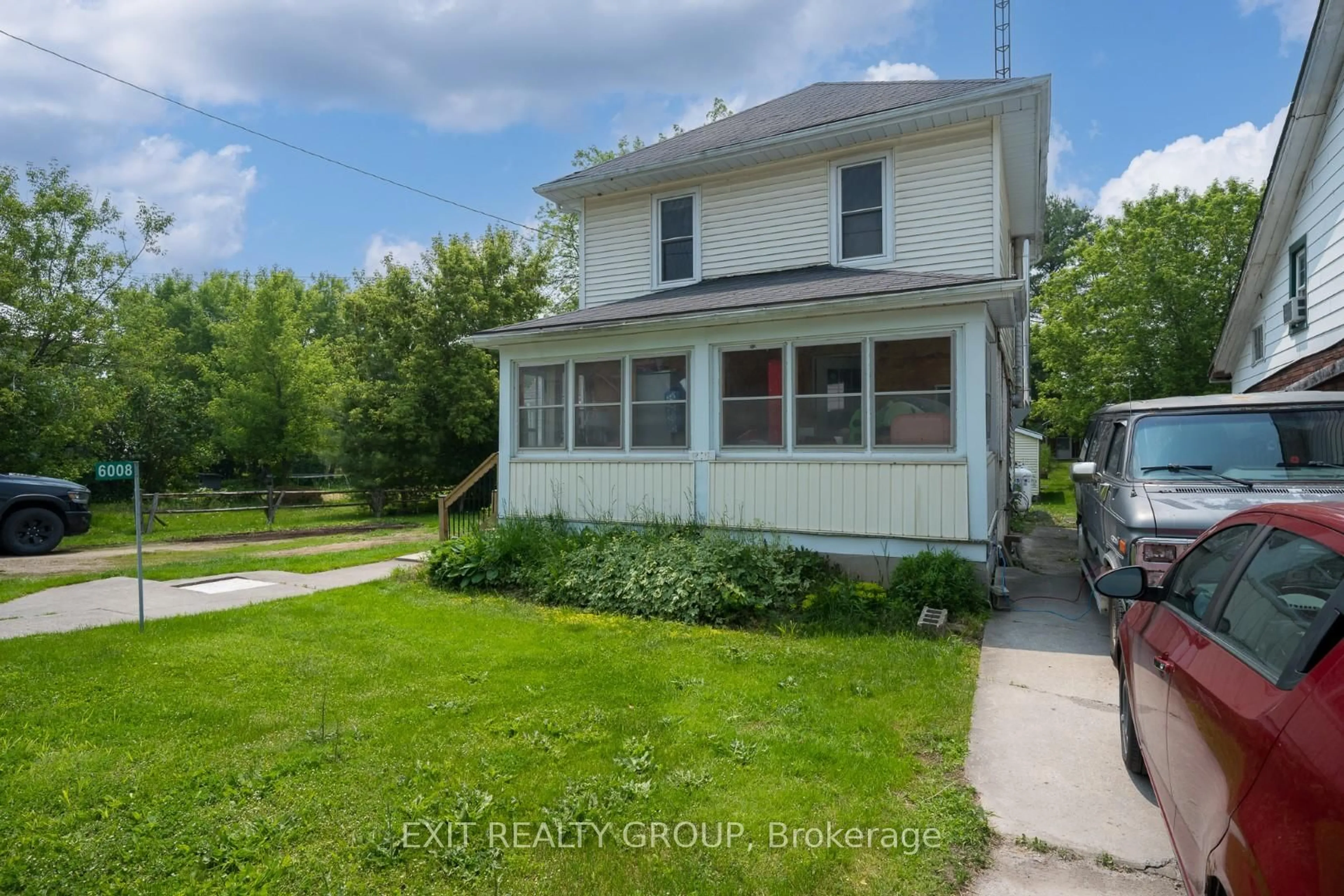 A pic from outside/outdoor area/front of a property/back of a property/a pic from drone, street for 6008 County Road 41, Stone Mills Ontario K0K 2A0
