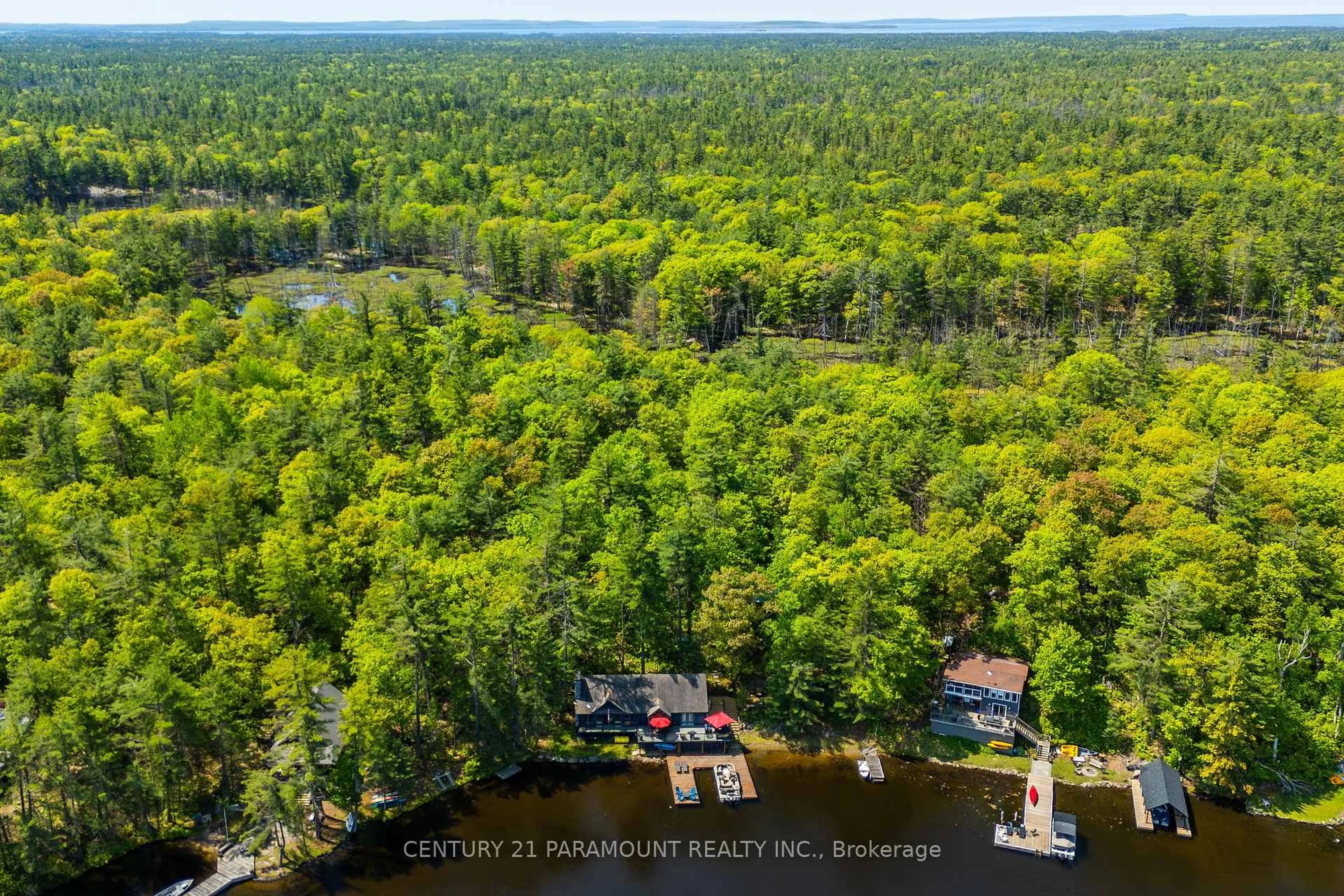 A pic from outside/outdoor area/front of a property/back of a property/a pic from drone, forest/trees view for 6394 Go Home Lake Shore Island, Georgian Bay Ontario L0K 1S0