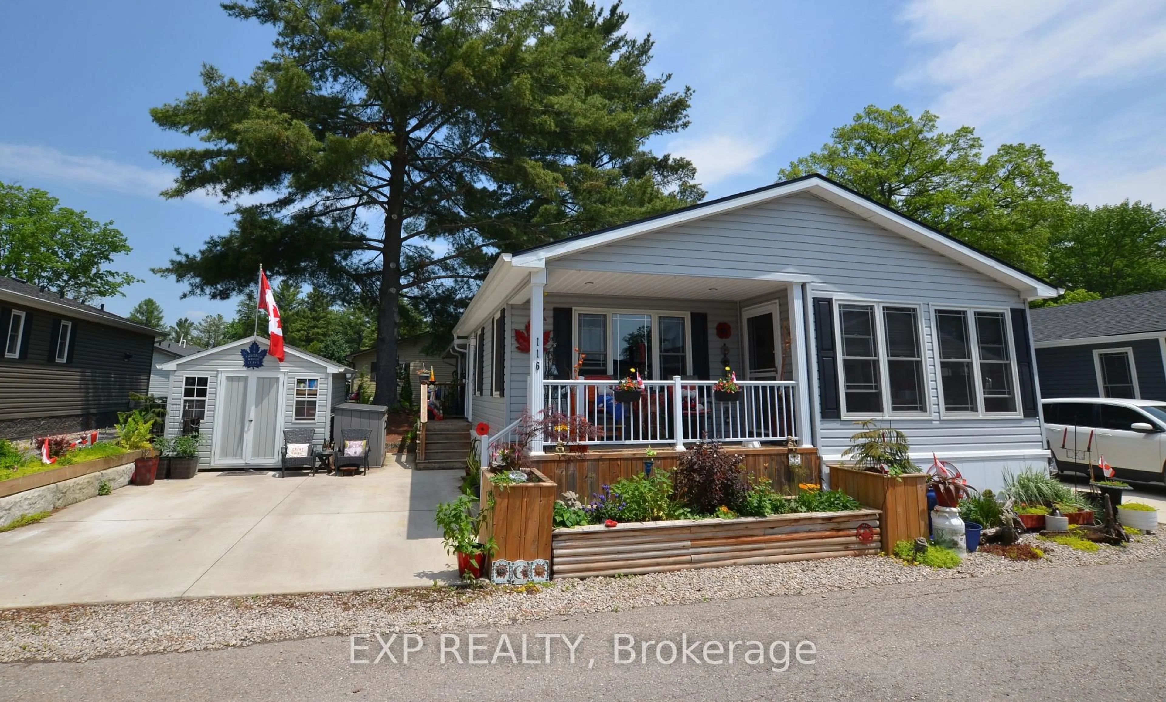 Home with vinyl exterior material, street for 22790 Amiens Rd #116, Middlesex Centre Ontario N0L 1R0