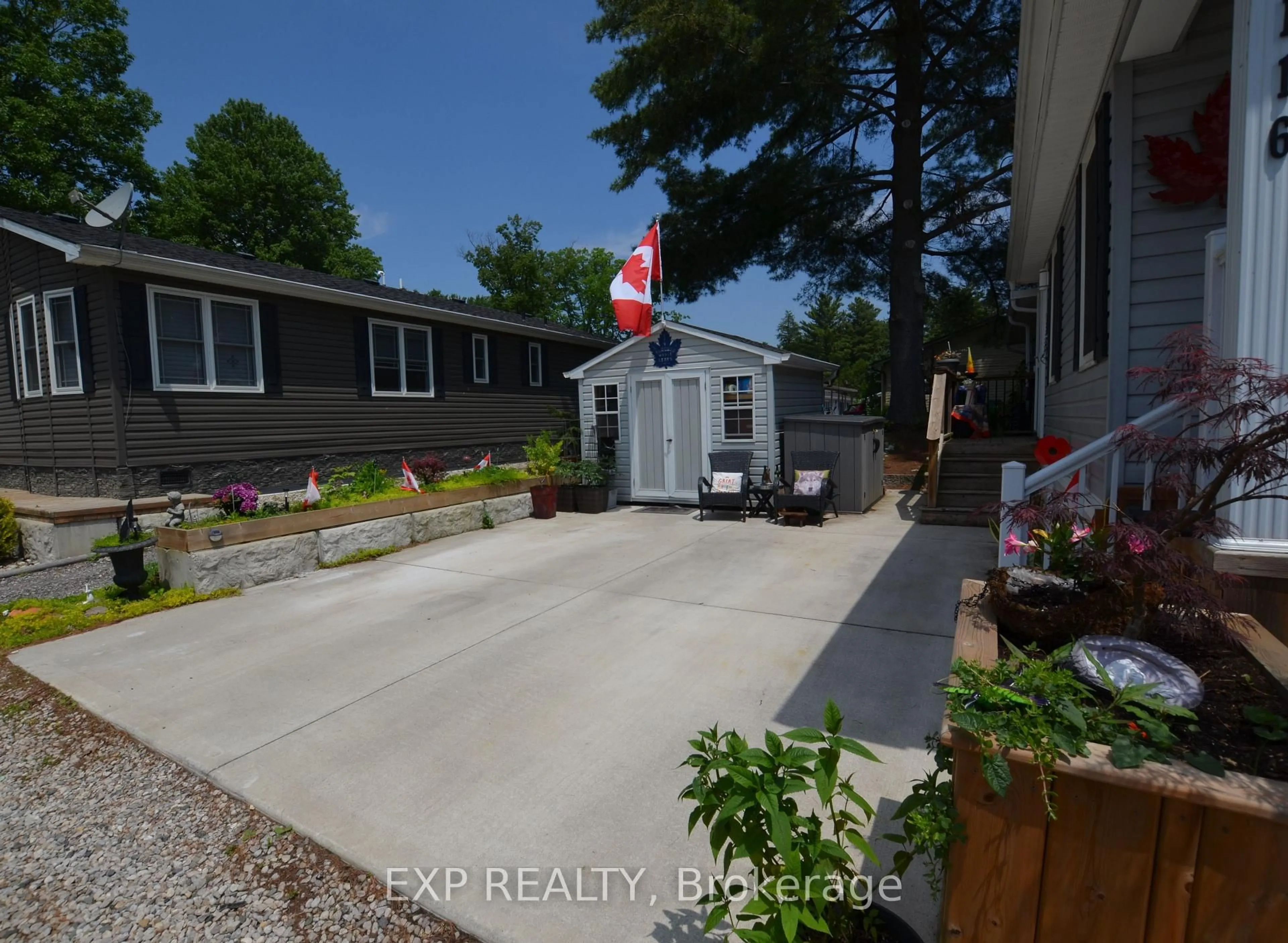 A pic from outside/outdoor area/front of a property/back of a property/a pic from drone, street for 22790 Amiens Rd #116, Middlesex Centre Ontario N0L 1R0