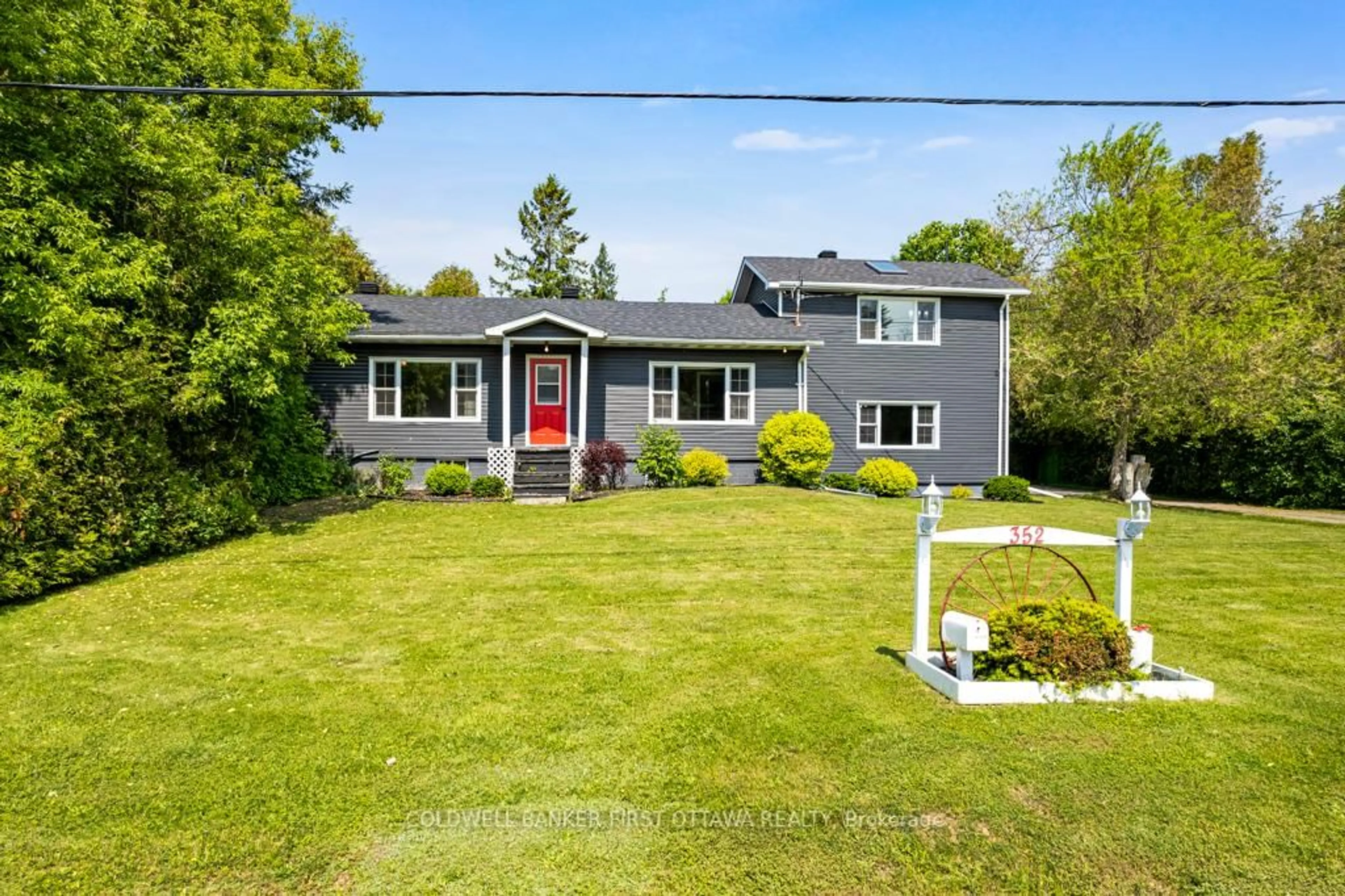 A pic from outside/outdoor area/front of a property/back of a property/a pic from drone, street for 352 Highway 15, Rideau Lakes Ontario K7A 0E5