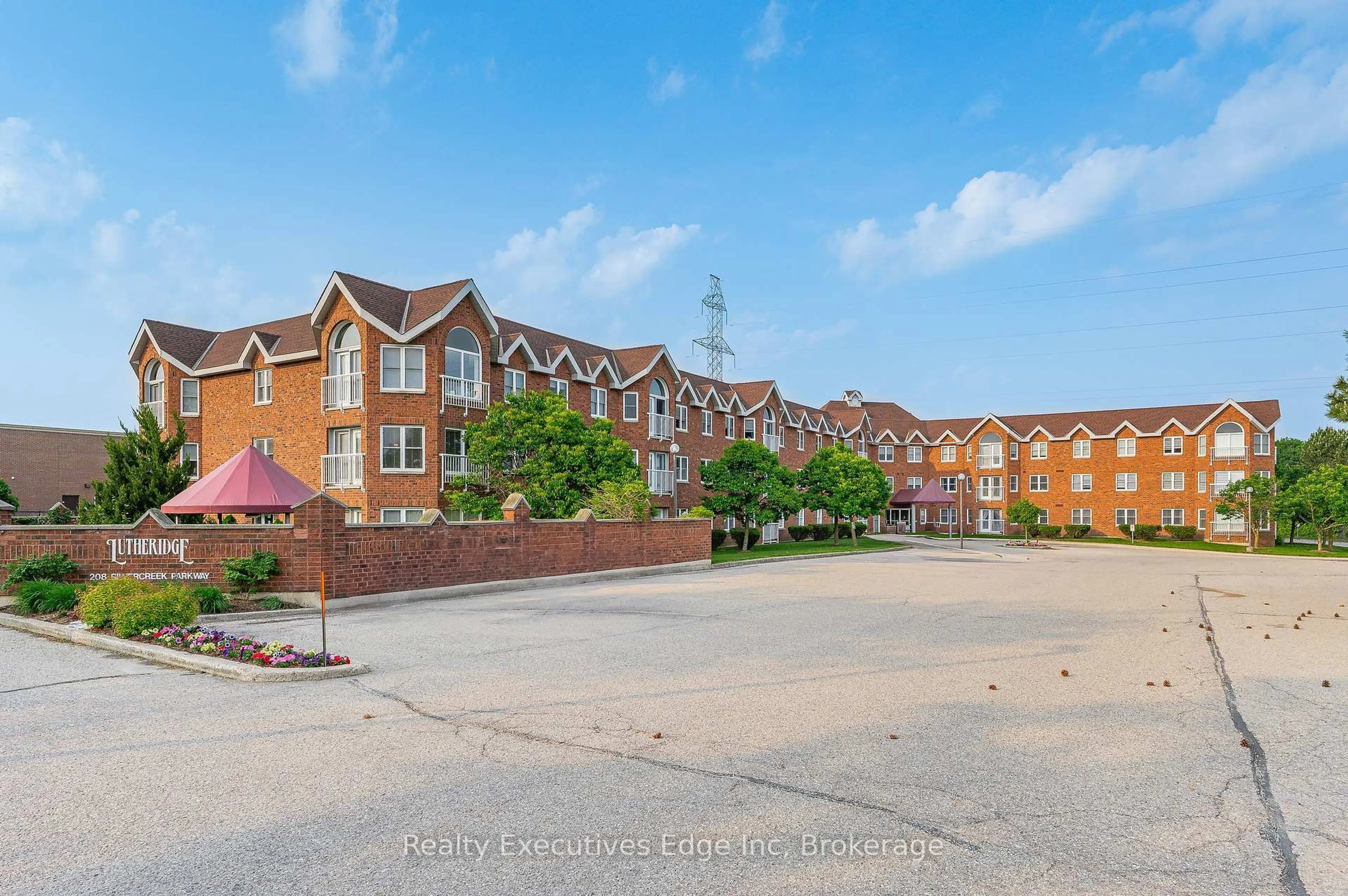 A pic from outside/outdoor area/front of a property/back of a property/a pic from drone, unknown for 208 Silvercreek Pkwy #312, Guelph Ontario N1H 8H2