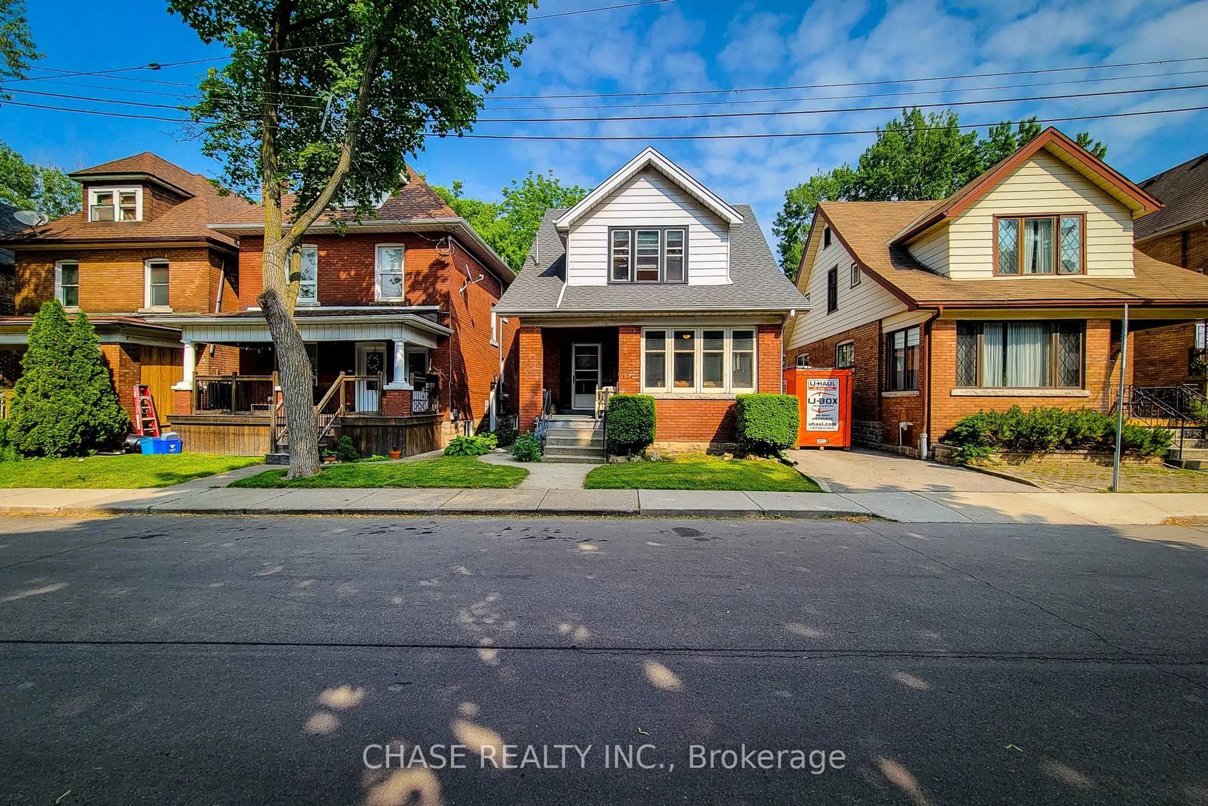 Home with brick exterior material, street for 63 Carrick Ave, Hamilton Ontario L8M 2W4