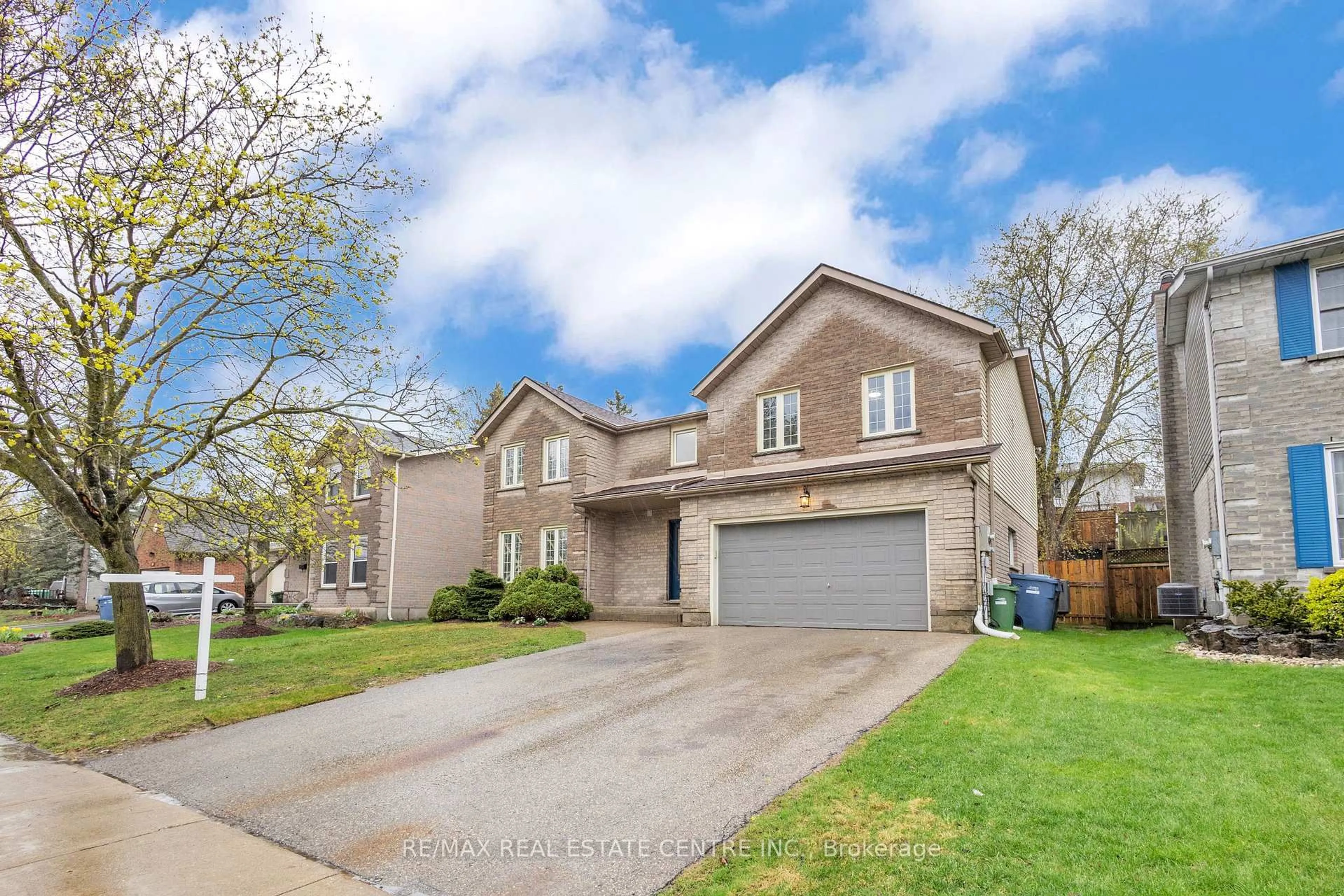 Home with brick exterior material, street for 370 Ironwood Rd, Guelph Ontario N1G 3N8