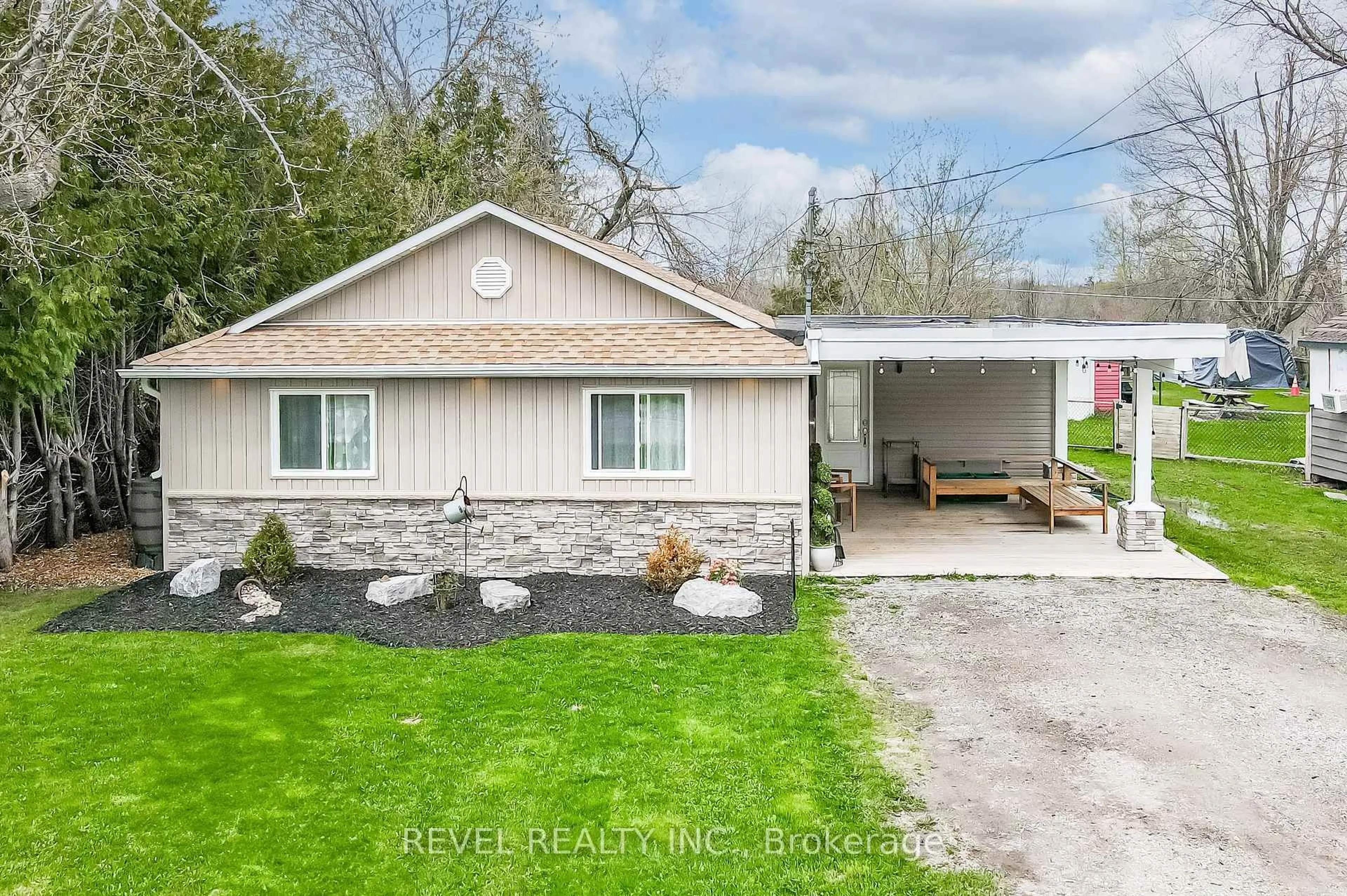 A pic from outside/outdoor area/front of a property/back of a property/a pic from drone, street for 411 LONG BEACH Rd, Kawartha Lakes Ontario K0M 1G0