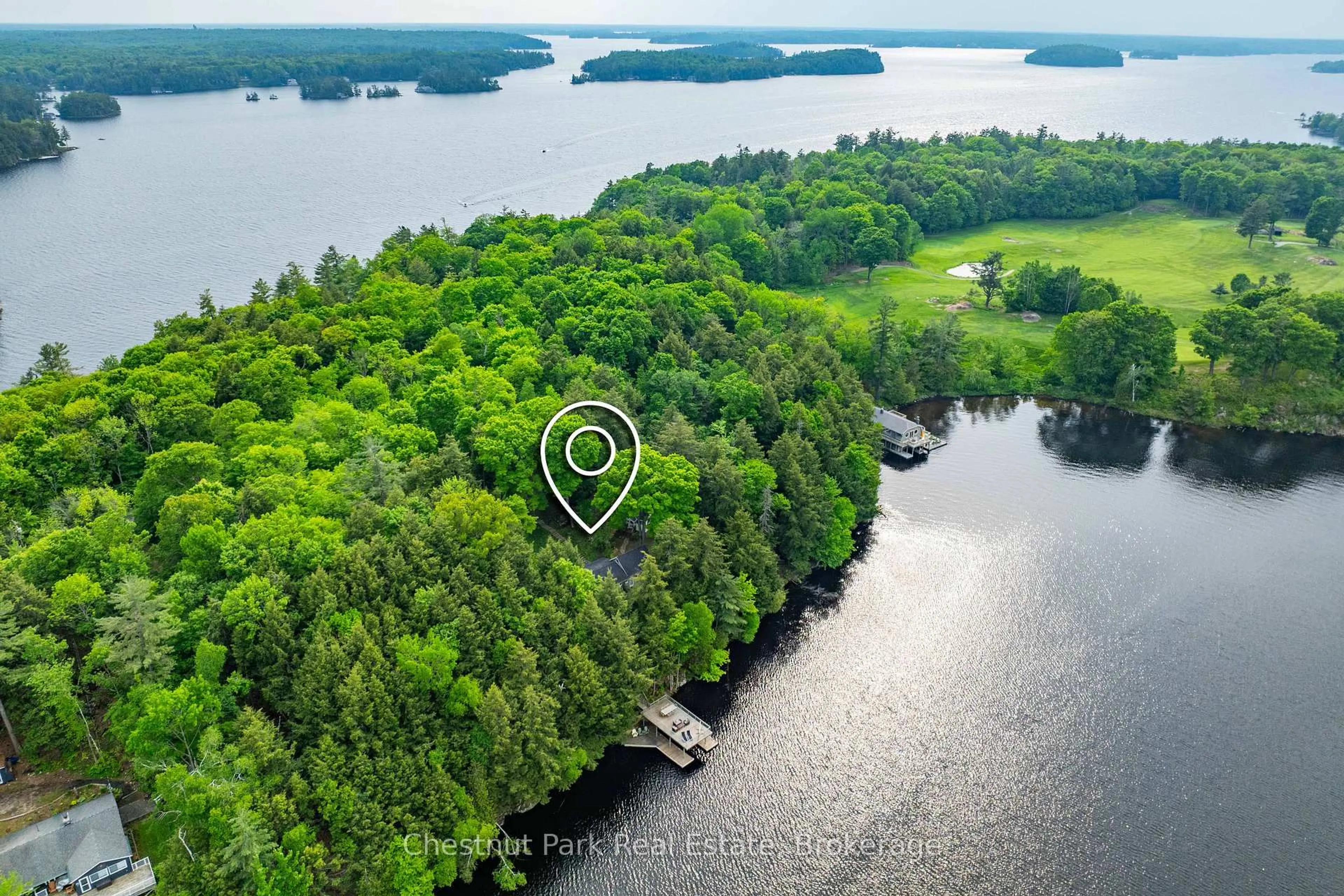 A pic from outside/outdoor area/front of a property/back of a property/a pic from drone, water/lake/river/ocean view for 1111 Tondern Island Rd, Muskoka Lakes Ontario P0B 1E0