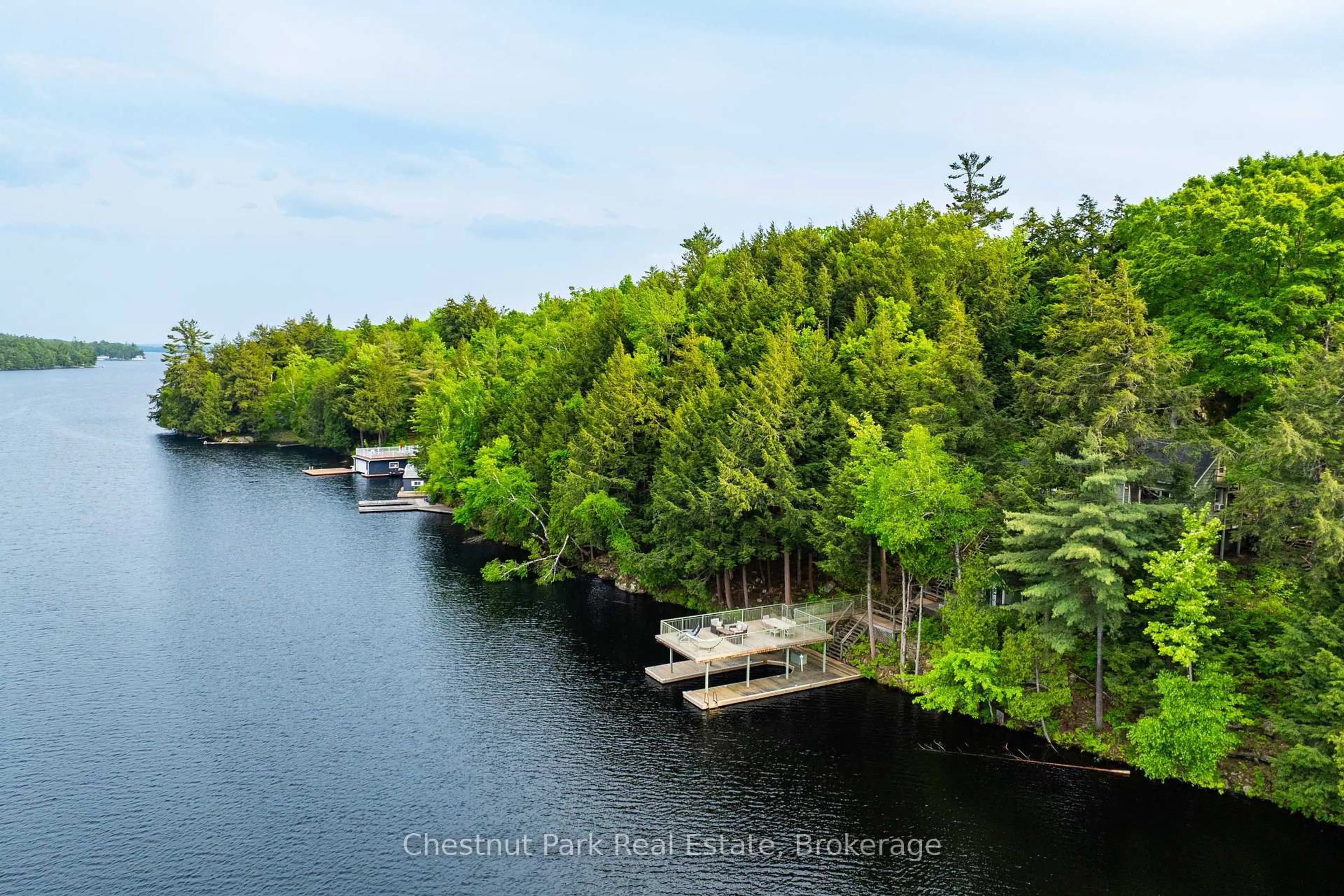 A pic from outside/outdoor area/front of a property/back of a property/a pic from drone, water/lake/river/ocean view for 1111 Tondern Island Rd, Muskoka Lakes Ontario P0B 1E0